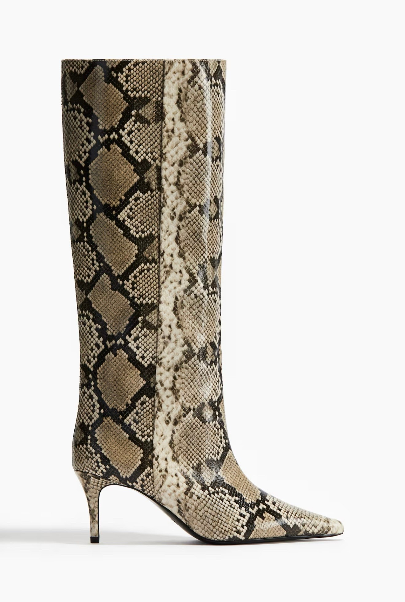 Knee-high, wide-leg boots with pointed toes and narrow heels. Lining and insoles in jersey.

#LTKcanada #LTKshoes #LTKwinter