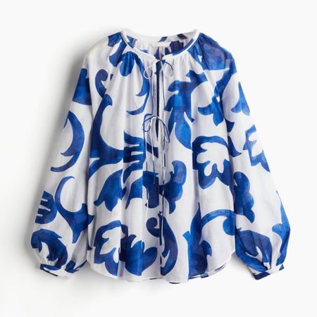 Blue and white patterned balloon sleeve blouse 

#LTKstyletip #LTKfindsunder50 #LTKSeasonal