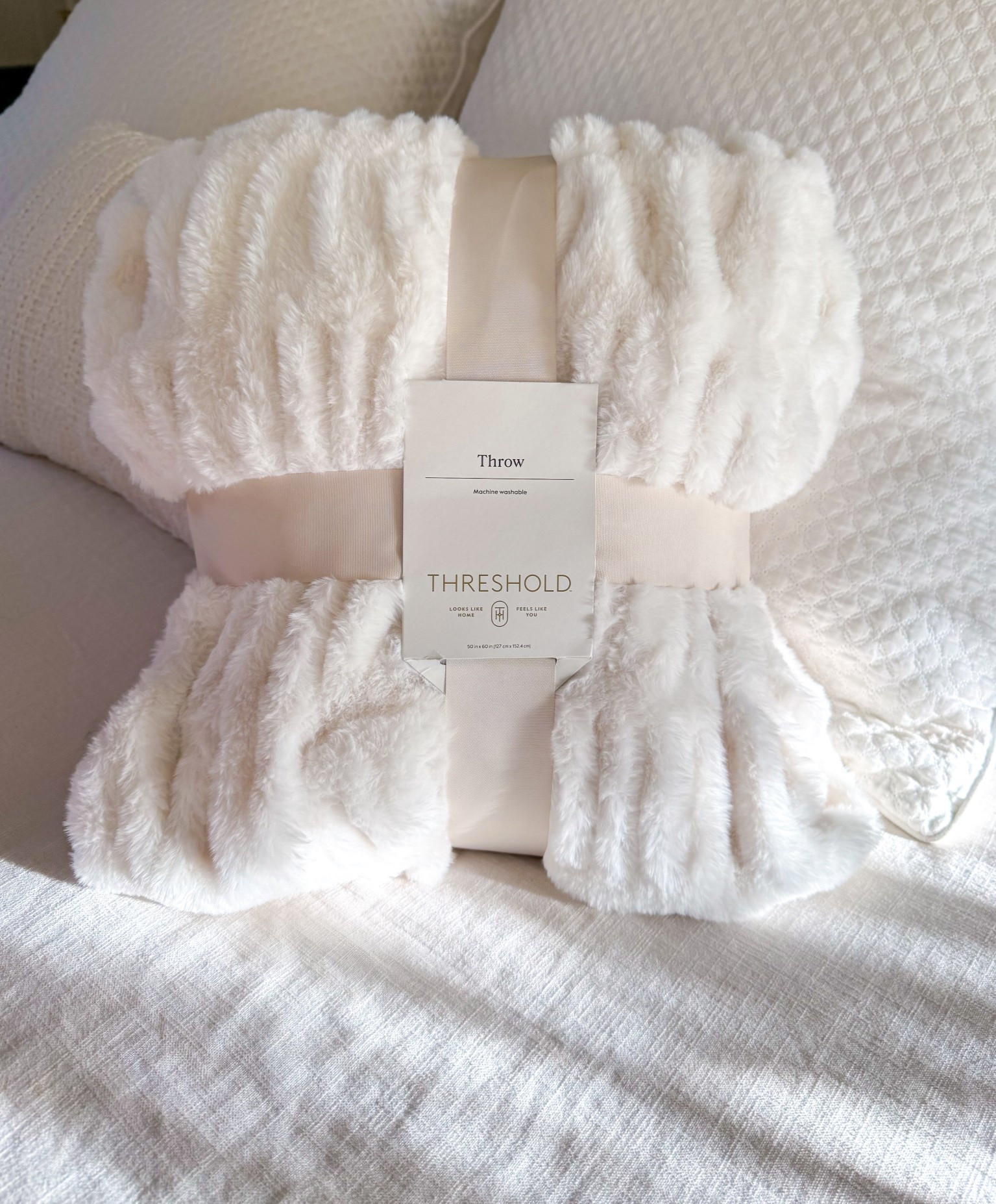 The softest blanket 🤍 I love mine—it’s so cozy and looks beautiful styled on a bed or sofa. One of my favorite gifts to give!

Target faux fur throw blanket // soft white blanket // gift guide for her 

#LTKHome #LTKFindsUnder50 #LTKGiftGuide