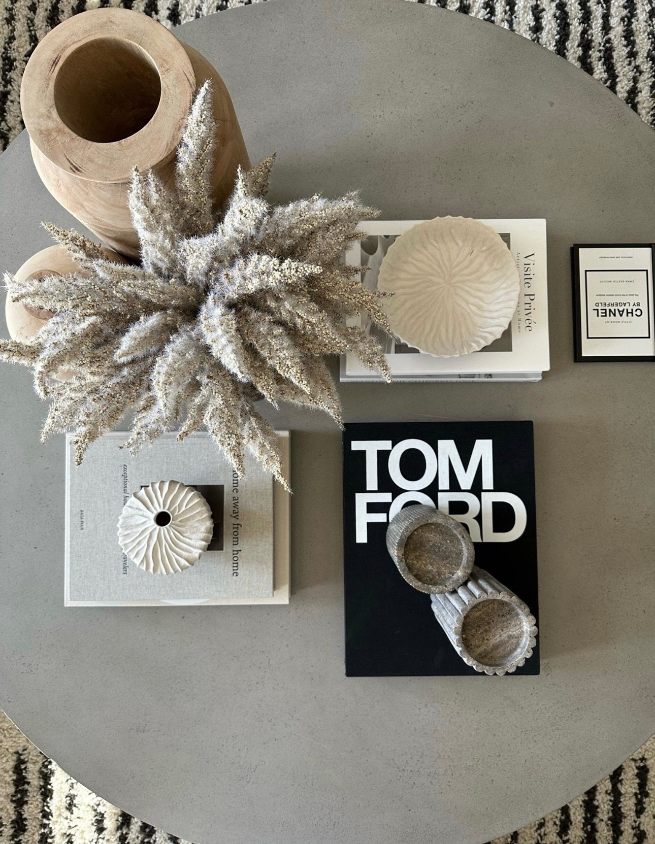 Modern organic coffee table styling! 

Home decor | neutral | coffee table | vase | candle holders | stone | wood | cement | fashion | viral | home books | top sellers


#LTKOver40 #LTKdayinmylife #LTKHome