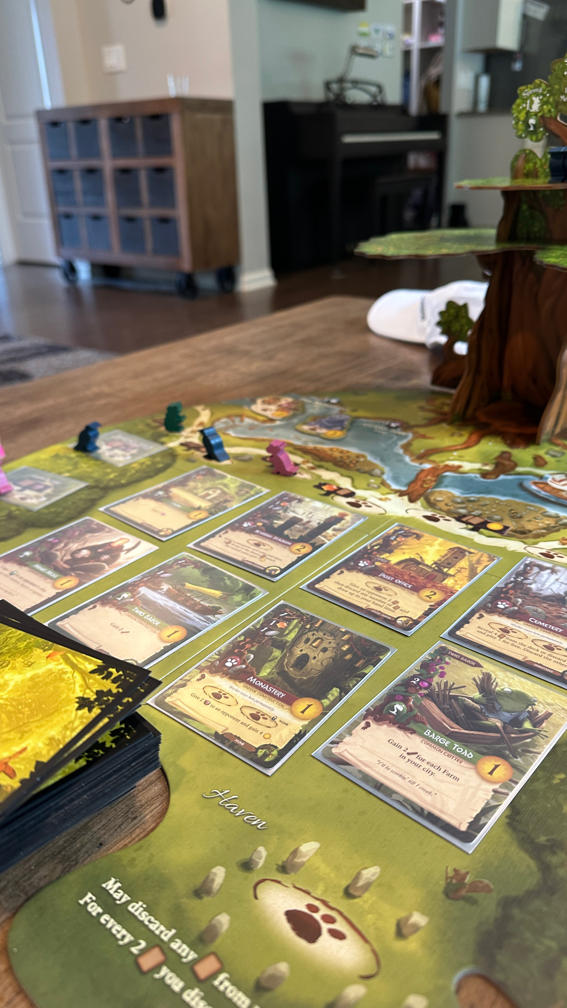 Everdell is simply one of the best family friendly games available.

The deluxe edition is nice, but the standard game is more than sufficient too!
