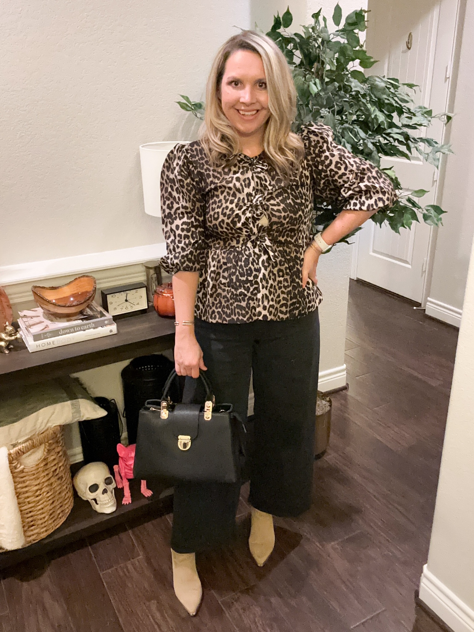 I finally caved and bought the tie front top and I love them!! This leopard print one is on sale and fits true to size—I’m wearing a medium. And I love this new black satchel that is on sale for $35! It’s such a classic designer look for less. My jeans are from Target and I’m wearing a size 8. Also, my boots are from Amazon and fit true to size.    

Jeans, boots, fall outfit, Amazon style 

#LTKItBag #LTKShoeCrush #LTKStyleTip
