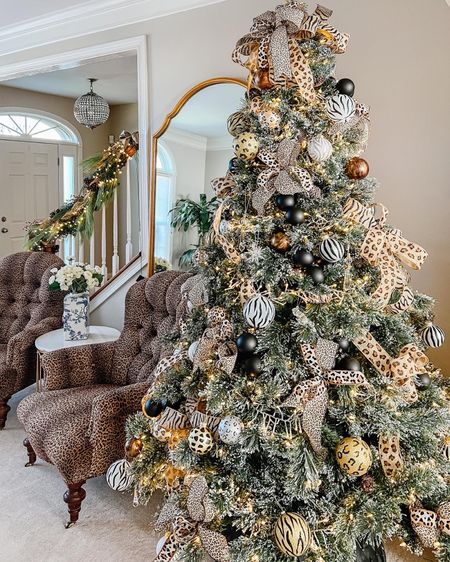 An animal print Christmas tree is a whimsical and fun idea. This design is a crowd favorite every holiday. See more Christmas tree decorations on my site  

#LTKhome #LTKHoliday #LTKSeasonal