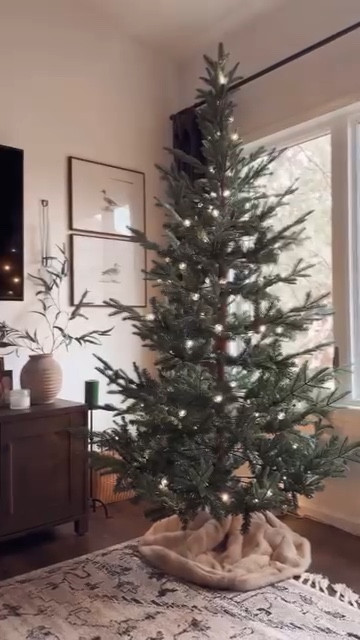 Looks so real you can almost smell the pine. 😌 This cozy, perfectly sized faux tree brings the holiday magic right into your home  

#LTKSeasonal #LTKHoliday #LTKCyberWeek