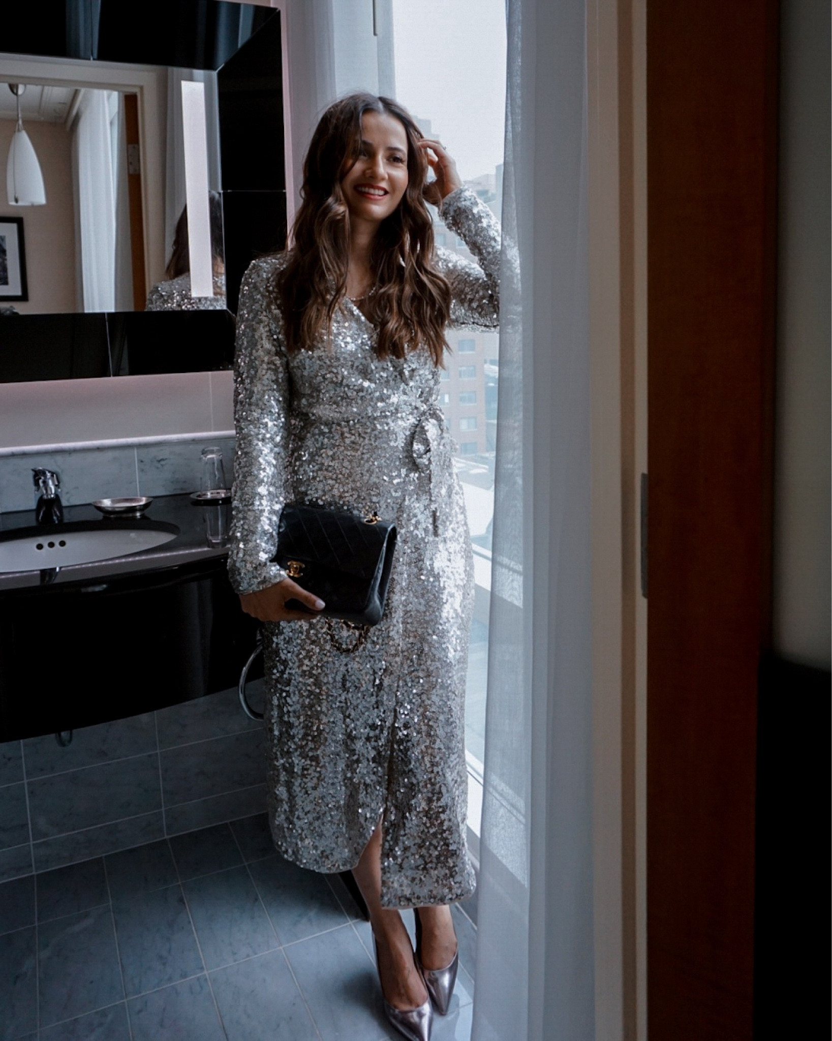 H&M silver sequin wrap dress with black classic Chanel flap bag and silver heels 

#LTKSeasonal #LTKitbag #LTKstyletip