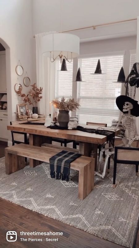 Halloween dining room spooky decor. Organic modern dining room table, cane dining chairs and Amazon finds 

#LTKHalloween #LTKhome