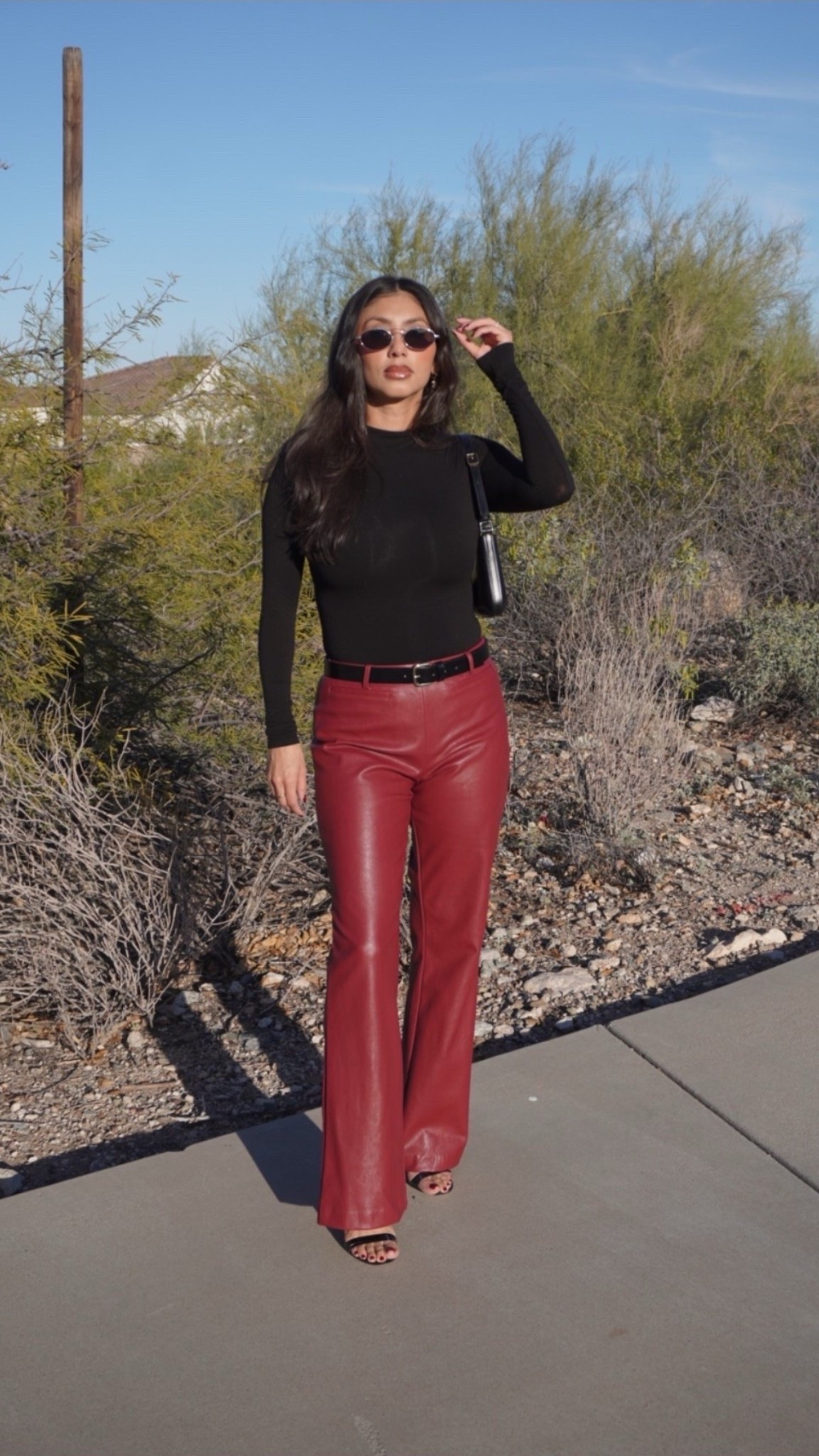 Faux leather pants
Bodysuit 
Sunglasses 
Accessories 
Spring outfit 

#LTKootd #LTKOver40 #LTKBeauty