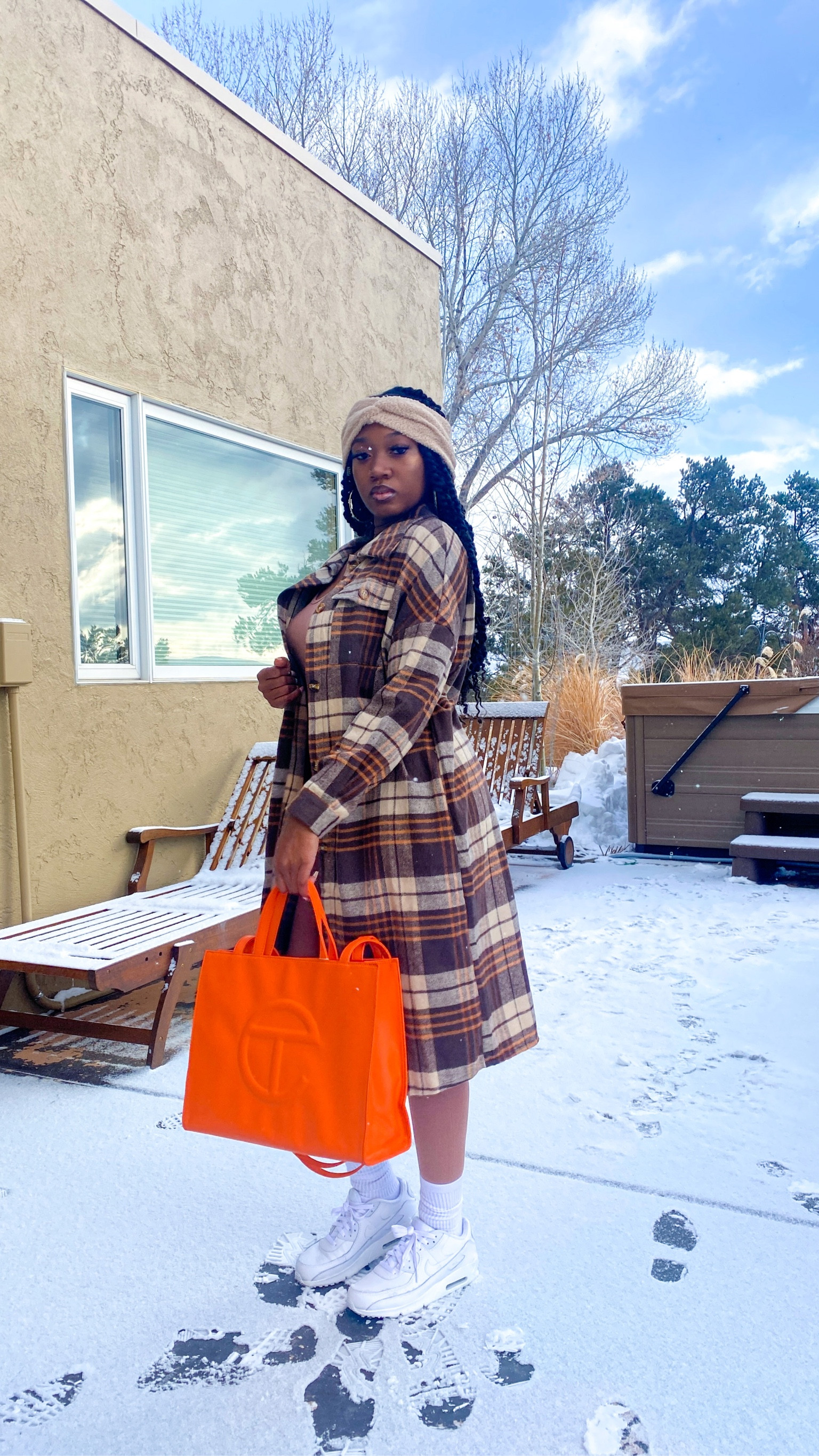 Winters in Aspen, black woman models SHEIN brown plaid coat

#LTKSeasonal #LTKTravel #LTKFindsUnder100