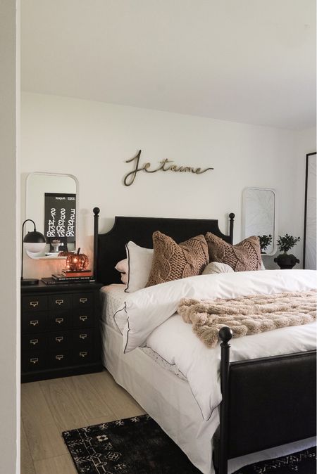 Fall bedroom decor! The colossal knit pillows are so gorgeous in person!! I linked this bed and some similar black upholstered beds. #meandmrjones #homesweetjones 

#LTKhome #LTKunder50 #LTKSeasonal