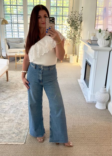 High waist wide leg jeans are Zara. Linked similar. White one shoulder too. Linked similar. Shop this look. 

#LTKstyletip #LTKunder100 #LTKunder50