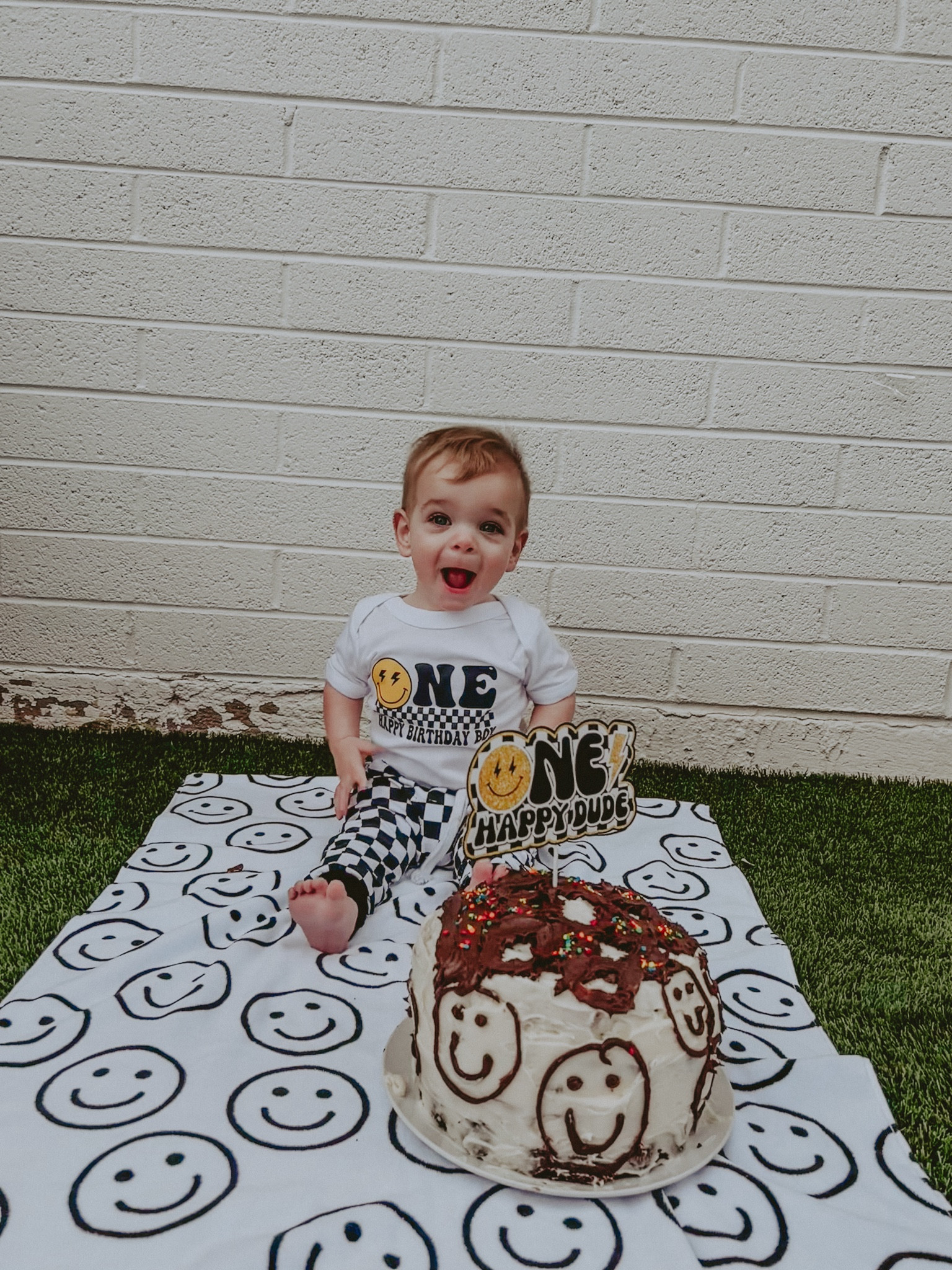 First birthday party theme and birthday cake for 1 year old boy! ONE happy dude 🙂 linked is the set we used for everything! We took the pieces we wanted to use for the decor and made it our own 🥰 smiley face birthday, smile happy face birthday decor 

#LTKbaby #LTKkids #LTKfamily