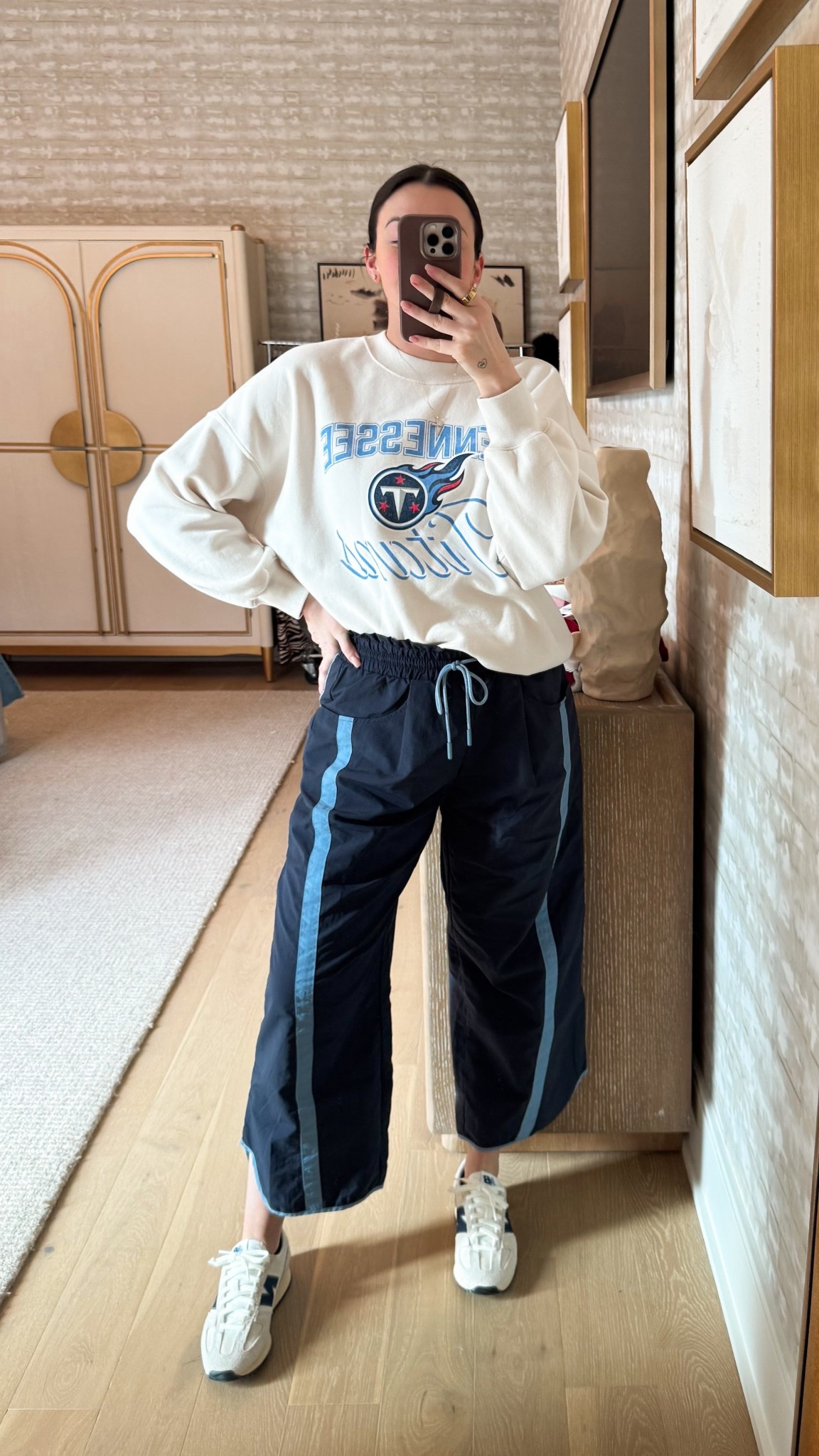 Comfy mom outfit. My Titans sweatshirt (M) is on sale, pants are a (much cheaper) Free People lookalike (M) and these New Balance sneakers are fully in stock!

#LTKSaleAlert #LTKmomlife #LTKootd