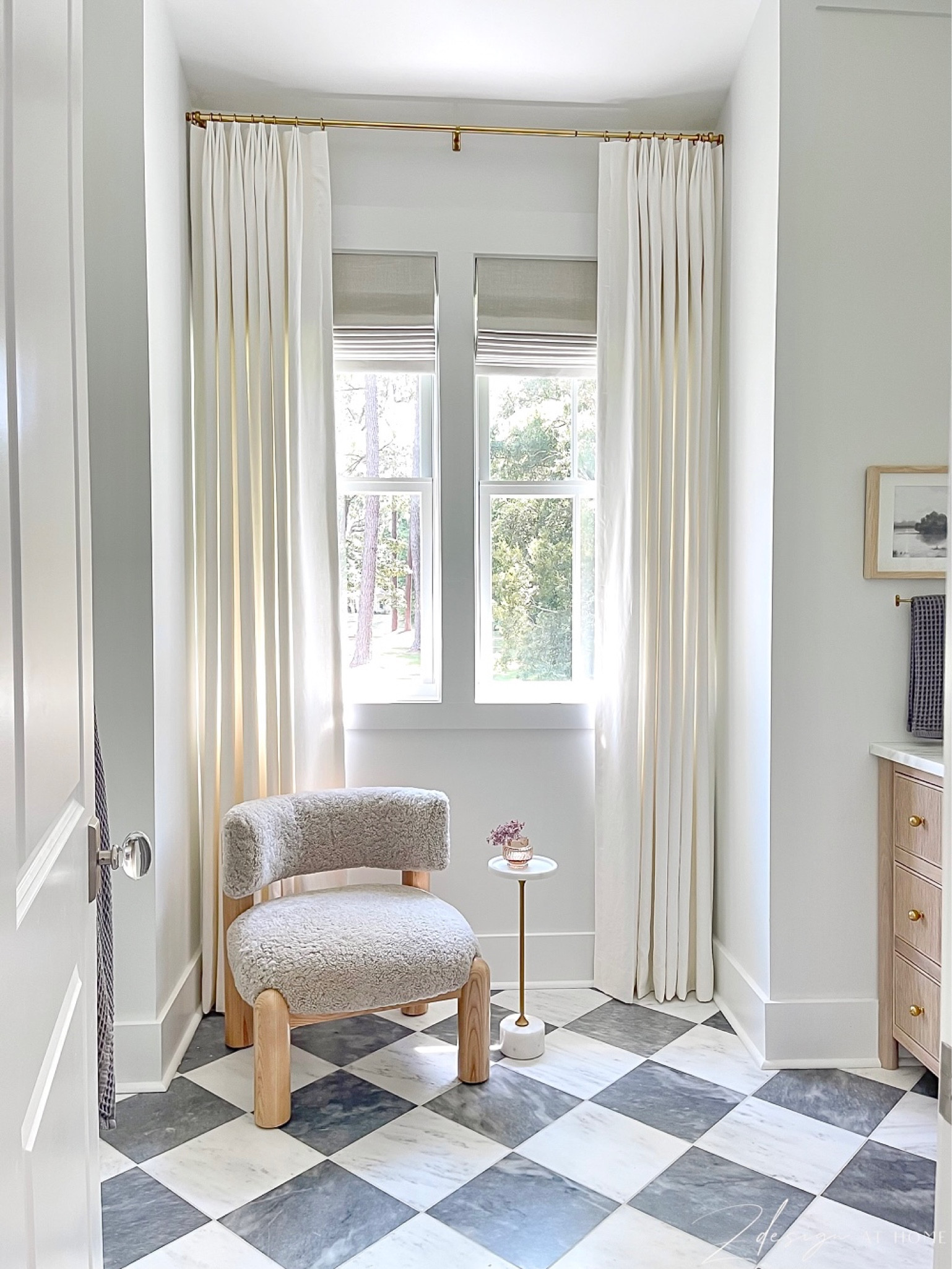 Bathroom decor, shearling chair, boucle chair, petite chair, bathroom tile, patterned tile, white curtains, marble side table, checkered floor tile, waffle weave towels, brass rod, window shades 

#LTKsalealert #LTKhome #LTKSeasonal