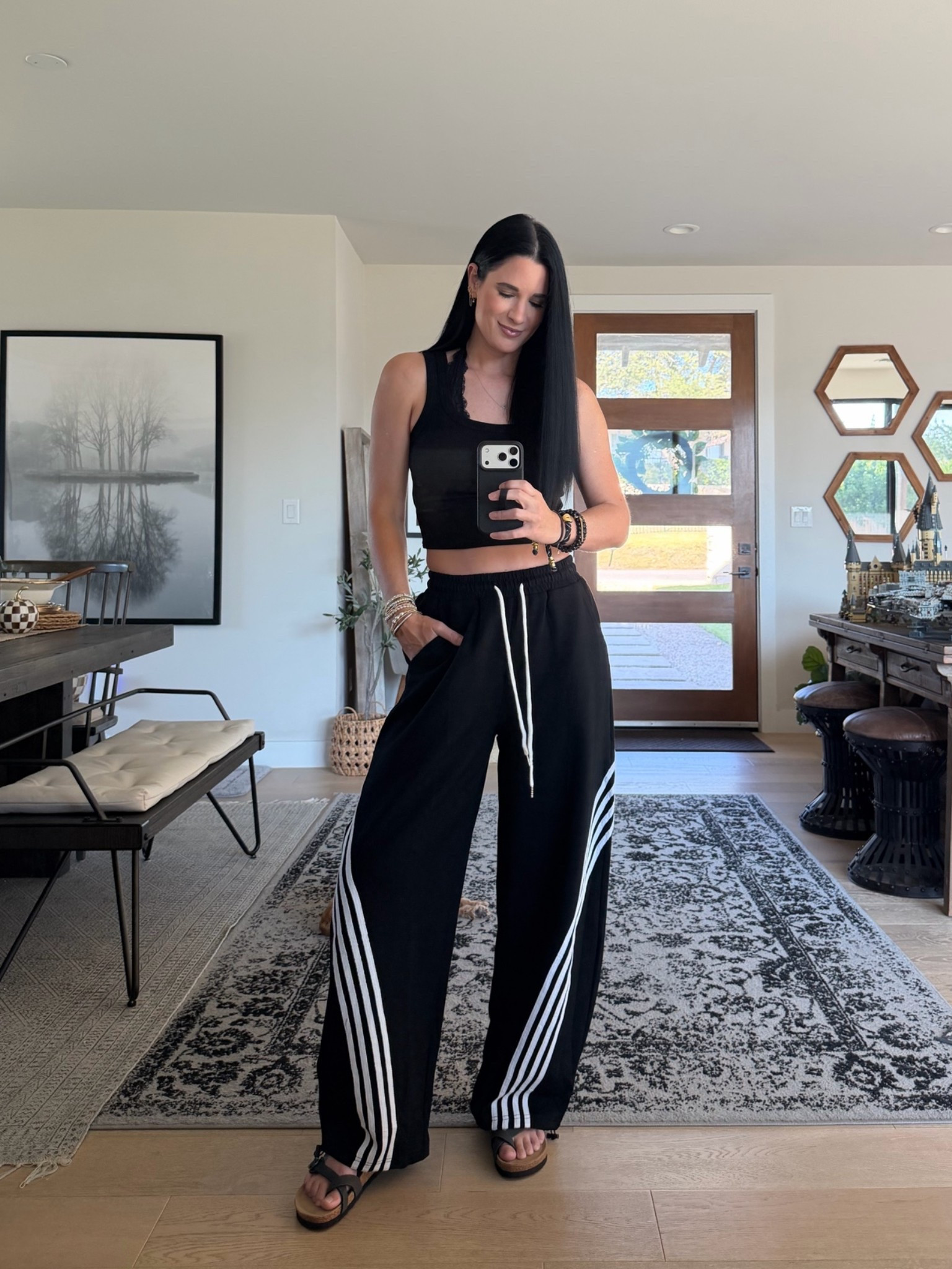 These pants remind me of adidas for a fraction of the price! 
I’m wearing a size small. They have a slight barrel leg to them as well.