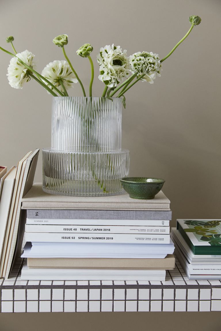 Vase in fluted glass. Diameter at the top 16 cm. Height 21 cm.CompositionGlass 100%Art. No.103429... | H&M (UK, MY, IN, SG, PH, TW, HK)