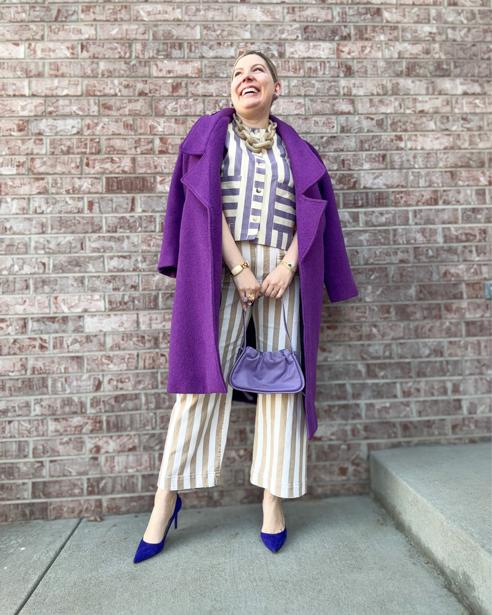 Off the Wall(paper) - Look 5
A curated style series 

Color blocking - but make it striped.  I love this look because it combines some of my favorite things about spring (colors, stripes) with an epic coat that is perfectly appropriate for winter. Especially here in Denver it’s important to layer for different temps during the winter and I love mixing my warm weather and cool weather pieces. Very helpful for not getting super sad in the darker days of the year. 

Off The Wall(paper) is a celebration of one of my favorite styling hacks: MATCH EVERYTHING. I get outsized amounts of joy from a couple of funny things: 1. Lining things up (yes, literally) and 2. Finding things that match and then LINING THEM UP. This is that desire embodied in a capsule series. 

Coat - Line and Dot
Top - FRNCH
Pants - Maeve by Anthropologie @Anthropologie 
Shoes - Jimmy Choo
Necklace - Tuckernuck (piper k)
Bag - Yuzefi
Bracelets - Vintage & Rocksbox
Brooch - Chanel
Earrings - Oscar de la Renta

#LTKSeasonal #LTKsalealert #LTKstyletip