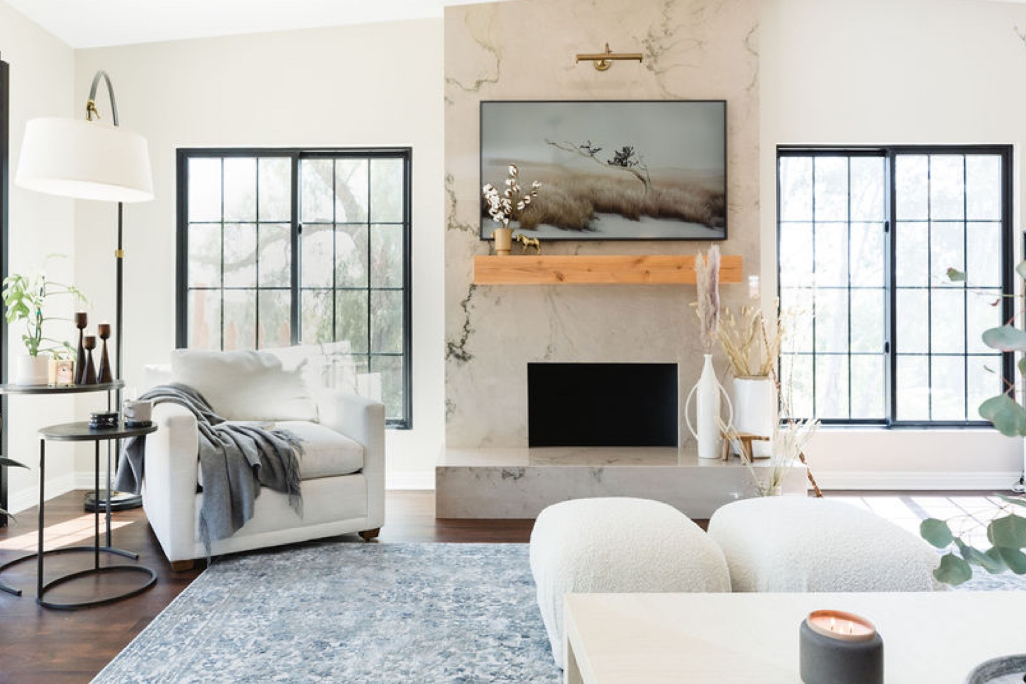 Farmhouse living room with a rustic fireplace mantle, oversized cozy chair, floor lamp, large area rug, ottoman and side table.

Home decor, interior design, living room

#LTKhome #LTKunder100