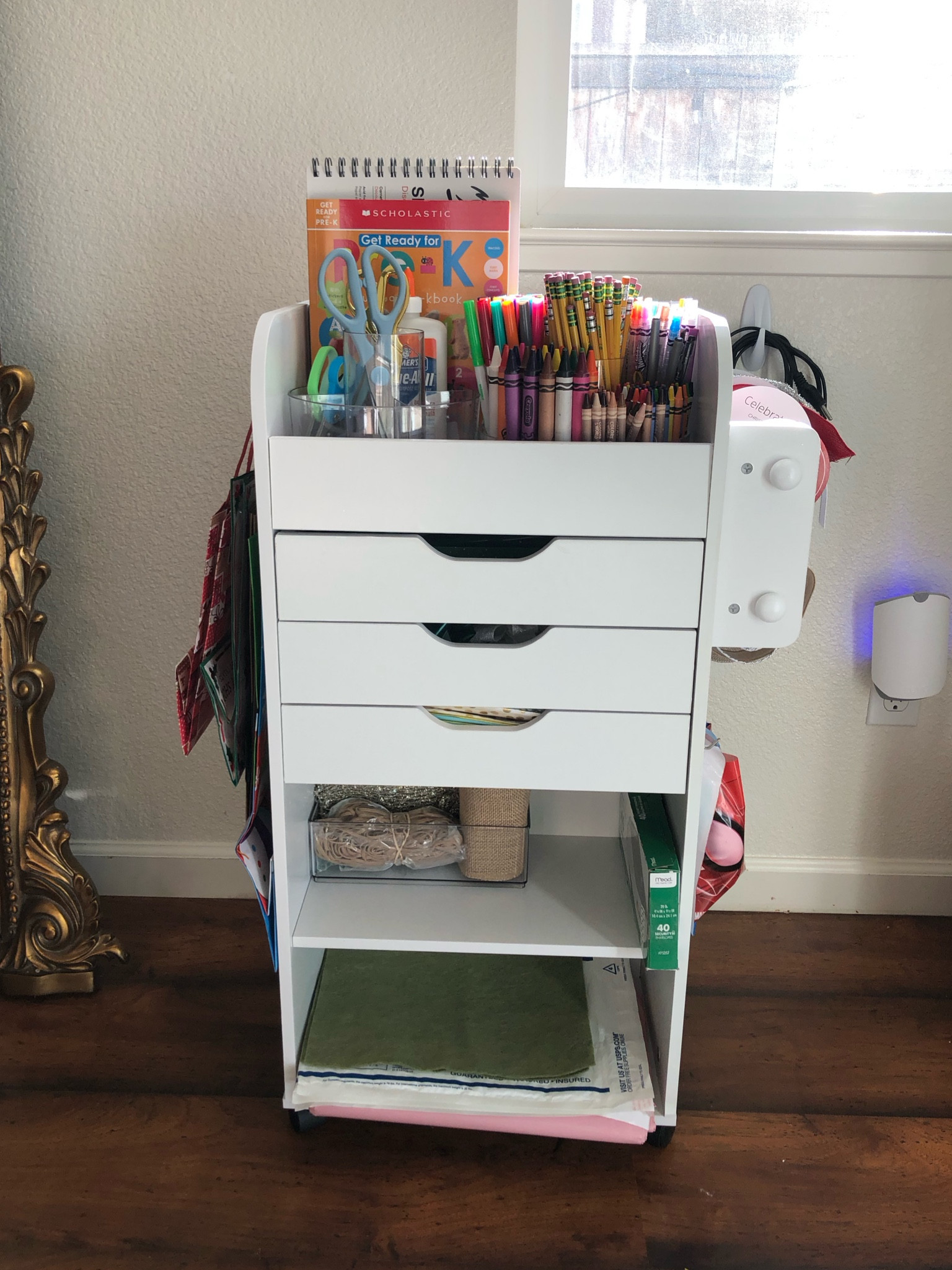 A craft or gift wrap organizer  on wheels!

#LTKhome #LTKkids #LTKfamily