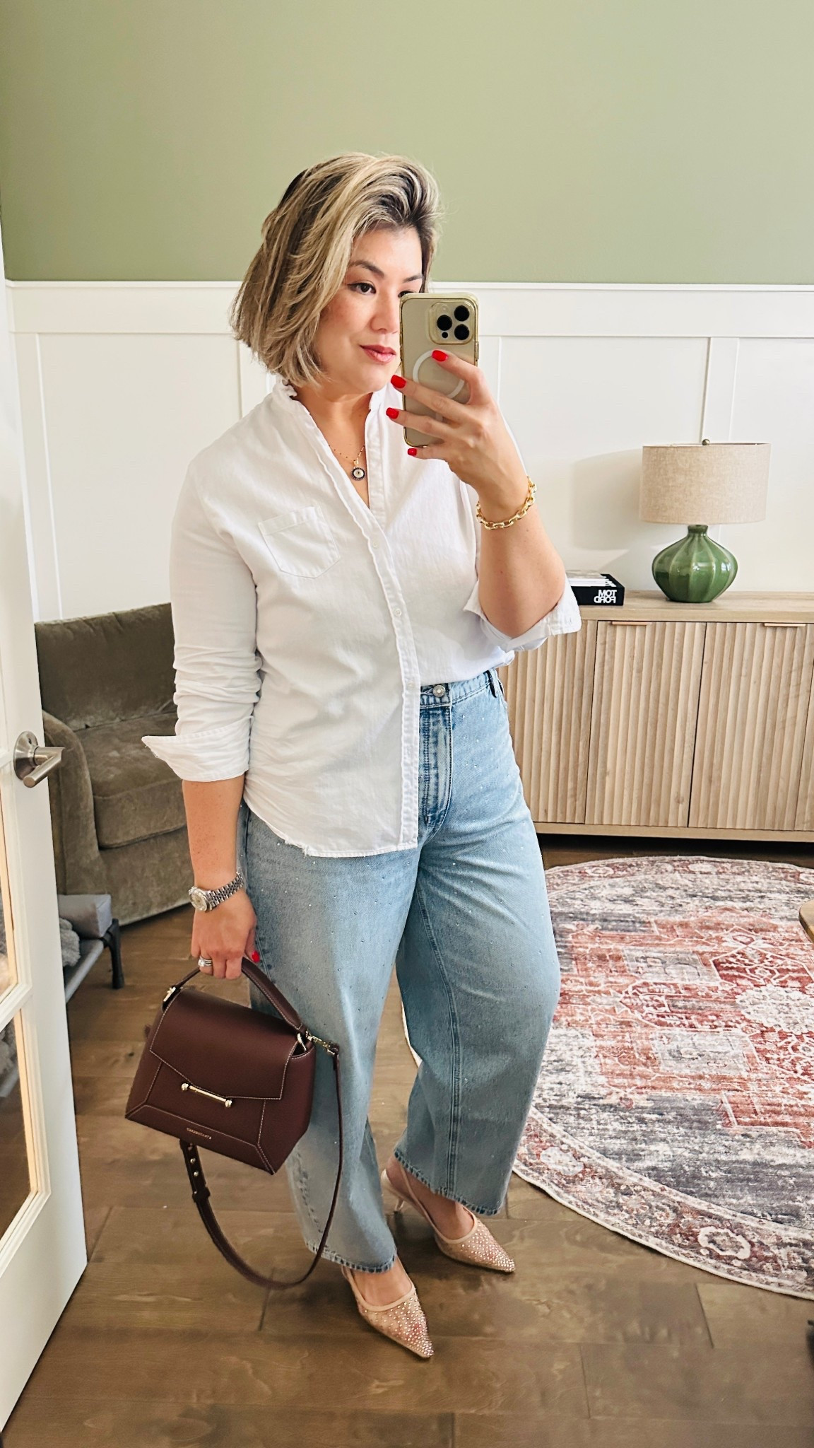 I’m wearing a size medium in the white button up ruffle top. It is a relaxed fit so I do recommend sizing down one. As for the jeans. I’m wearing those in a size 31. These run slightly big, I’m normally between a 31 or 32. I opted for the 31 and they are on the loose side.

#LTKMidsize #LTKOver40 #LTKootd