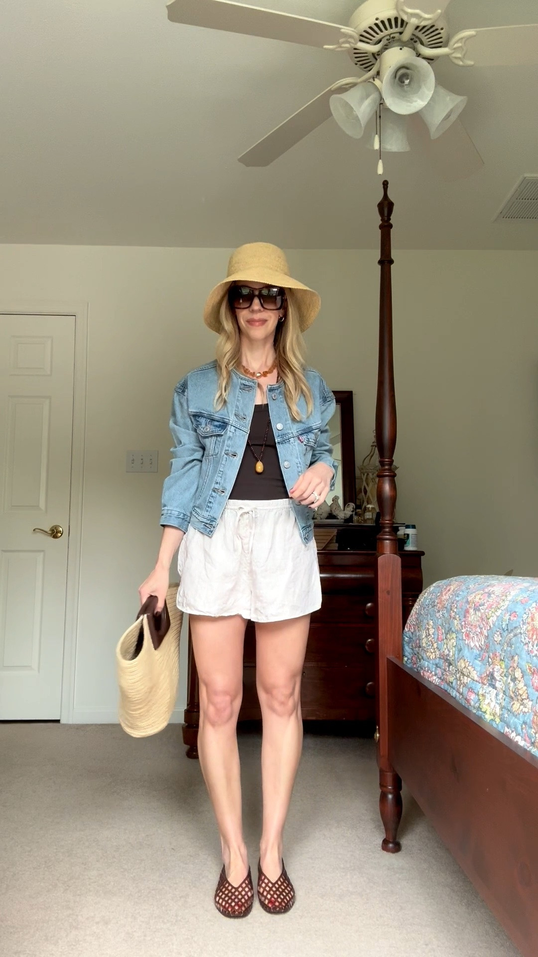 Casual summer outfit with @Janessa Leone straw bucket hat, cropped denim jacket, linen shorts, jelly shoes, Le Tanneur straw tote bag

#LTKSeasonal #LTKSaleAlert #LTKOver40