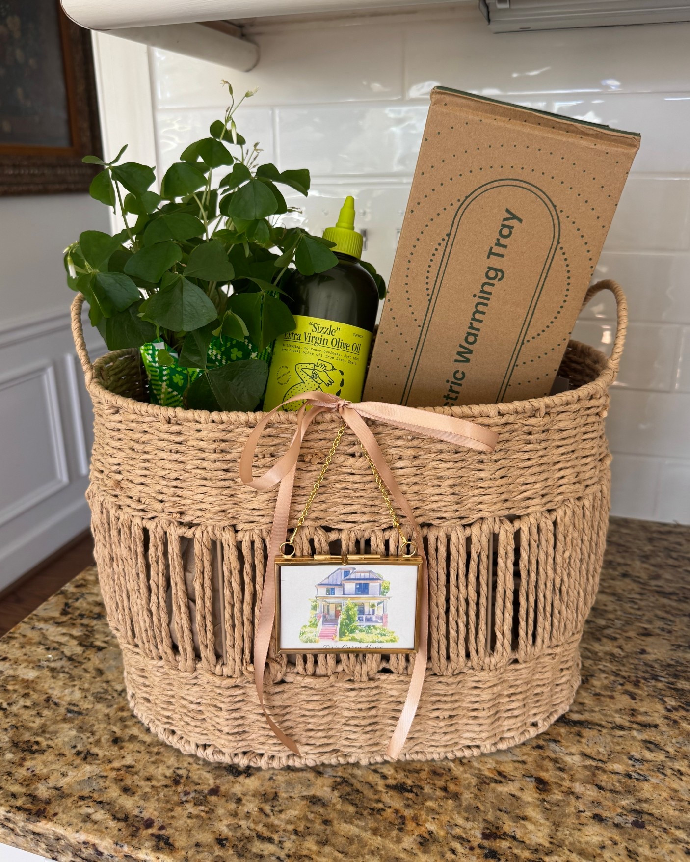 Cute new house gift basket I put together for my friends! Filled with some of my favorite home essentials (warming mat for hosting, storage basket, Garza olive oil and of course a house plant) along with the cutest watercolor ornament of their new house
Can also make a great Mother’s Day Gift!

#gifts #home #gifting #hosting #hostess #party #newhome #storage #cooking #kitchen

#LTKMothersDay #LTKSeasonal #LTKHome