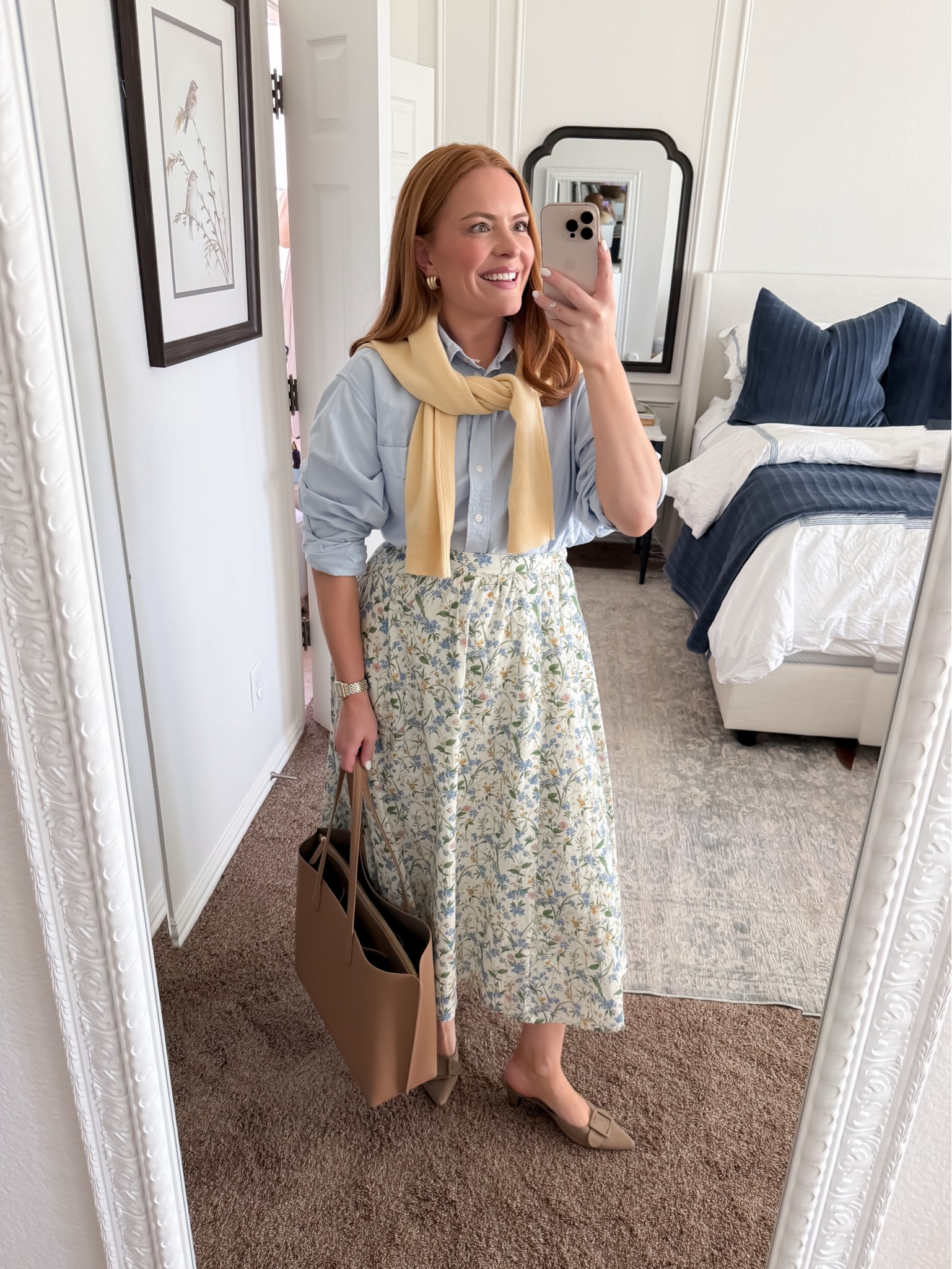 This is your polished, office-ready version 🤍

Outfit formula: button down + sweater over shoulders + midi skirt + flats

Fit notes:
• Skirt: true to size, hits mid-calf for that classic look
• Button down: slightly oversized for an effortless feel
• Sweater: lightweight, perfect for layering without bulk
• Flats: true to size, comfortable for commuting

Perfect for: work meetings, office days, elevated everyday

Everything linked in this LTK post ✨

#LTKMothersDay #LTKWorkwear #LTKmomlife