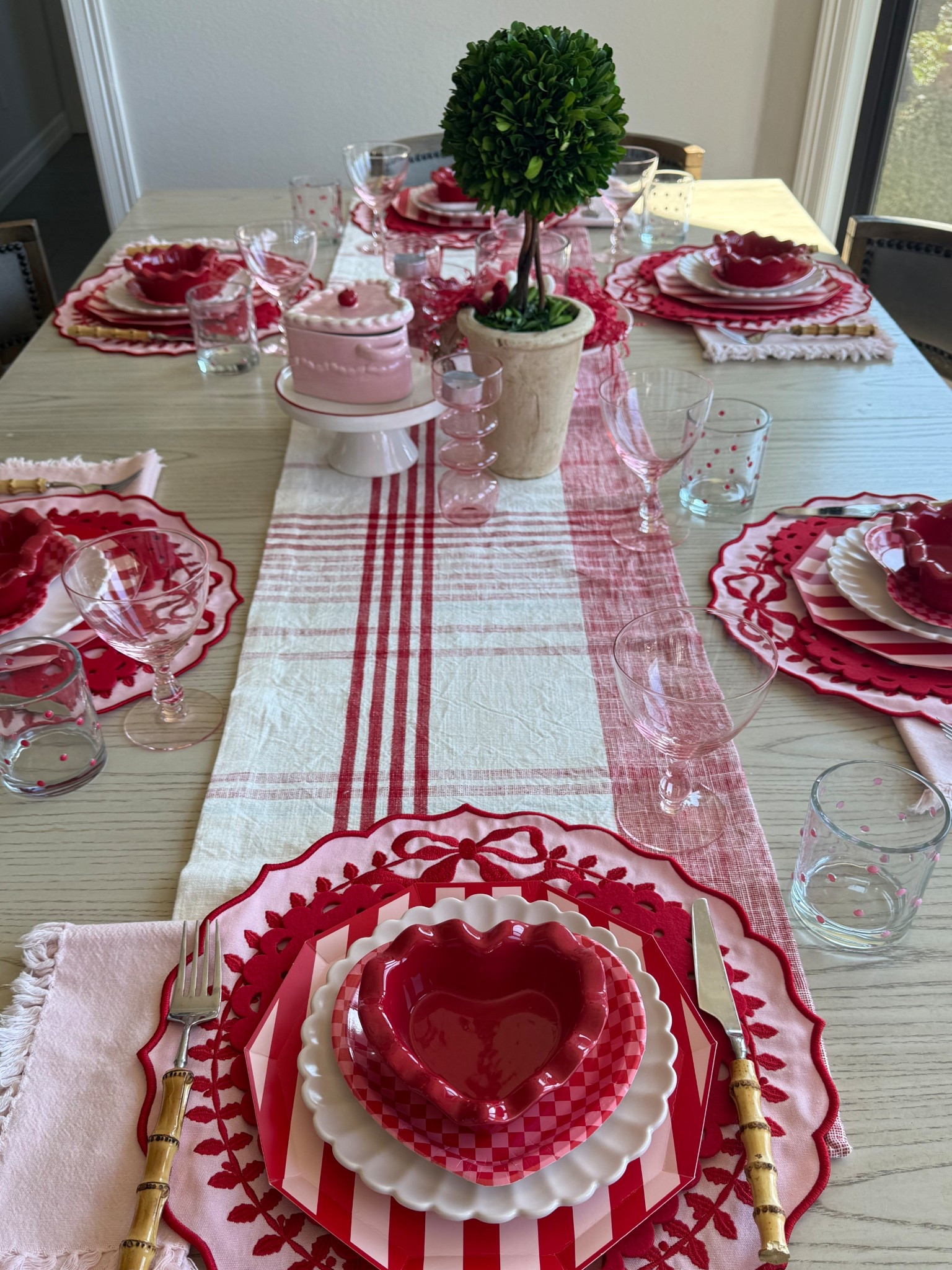 This red + white runner is giving all the Valentine’s charm 🤍❤️
I couldn’t track down my exact old Hearth & Hand with Magnolia runner, but I found some beautifully similar options that bring the same cozy, timeless feel to the table. 

Perfect for layering, date nights at home, or everyday love around the table.

#LTKValentine #LTKHome #LTKSeasonal