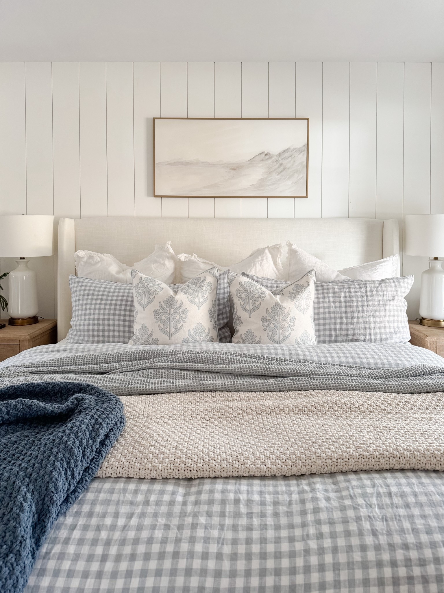 Layered coastal bedroom! This bedroom is all about relaxed layers, soft blues, and classic coastal patterns that make the space feel serene. 

#LTKHome