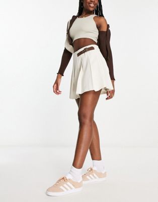Urban Revivo pleat mini skirt with buckle detail in off white | ASOS (Global)