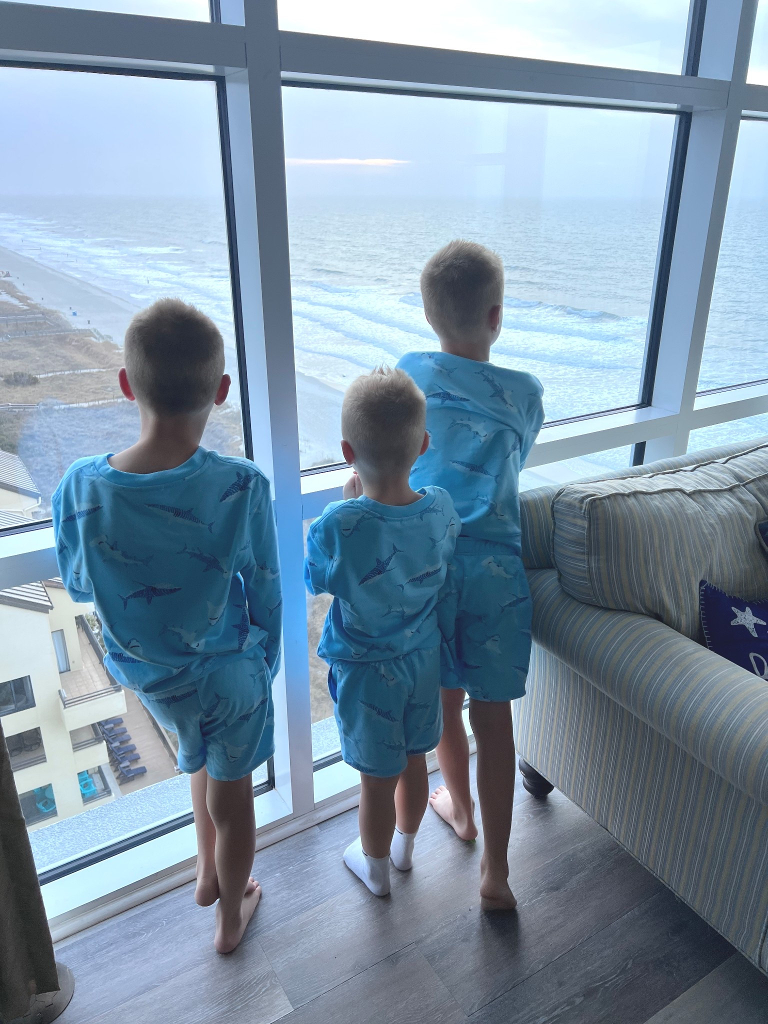 All three wearing comfy vacation shark Pjs from Target! Size XS ,Small and Medium 💙🦈

#LTKTravel #LTKKids #LTKSeasonal
