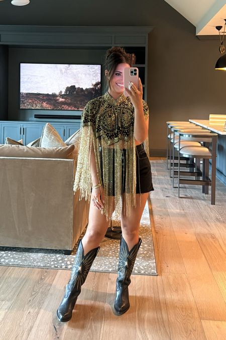 Wearing s/m in fringe cape (added a bralette under), size 26 in denim shorts, & boots true to size. Linking other boot options at different price points + my clear bag! Concert outfit, country concert, festival look // 

#LTKstyletip #LTKFestival #LTKfindsunder100