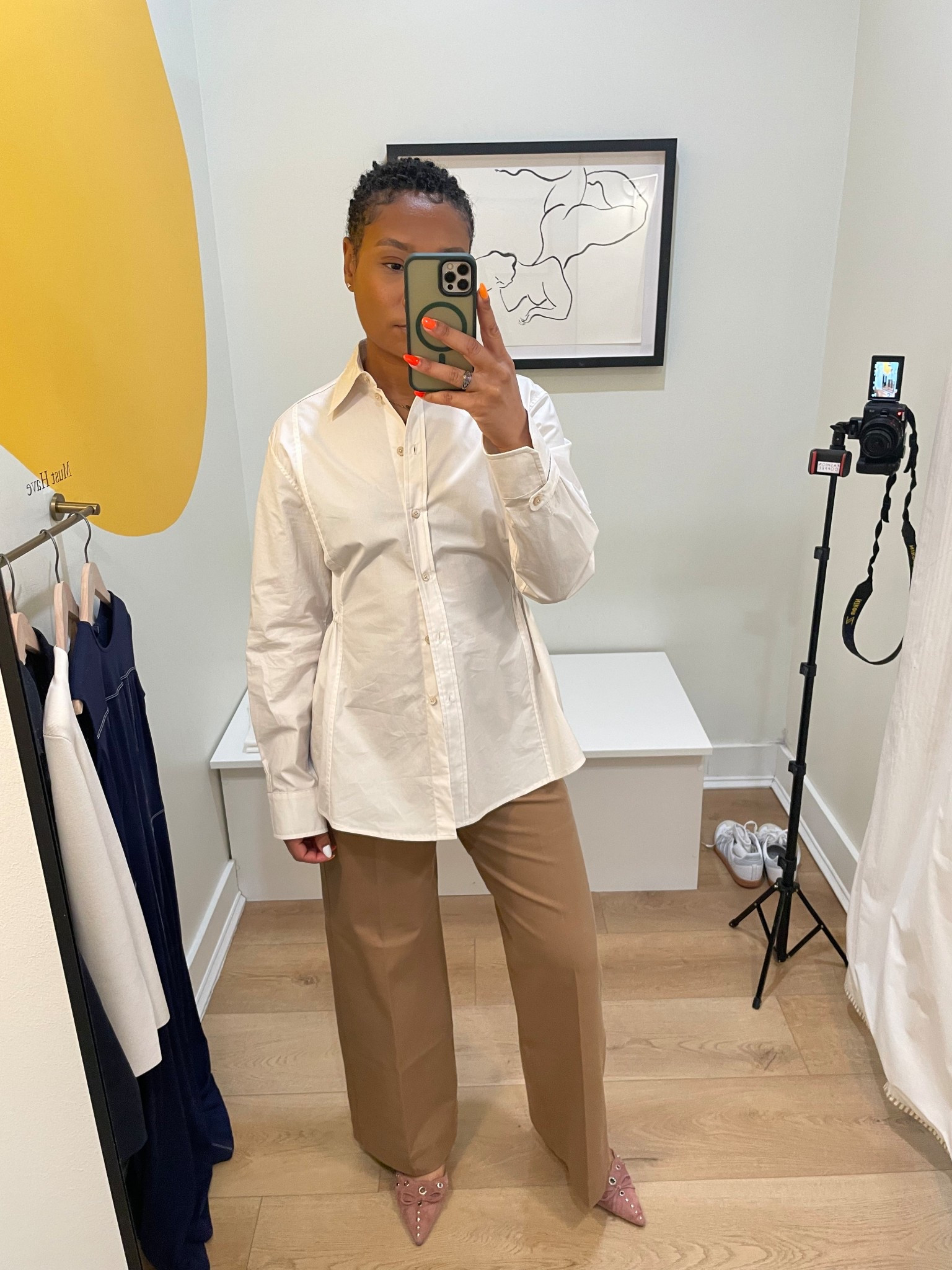 This is a classic button up with a twist. It has button going down the back and then has adjustable toes that accentuate your waist line!

#LTKU #LTKStyleTip #LTKWorkwear