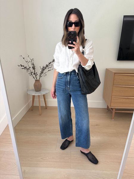 Everlane way high jeans in the most beautiful blue. These are super comfy and flattering. I cut the hems and sized up. Super high rise tho. 

Everlane shirt 2
Everlane jeans 25
Everlane flats 5
Anine Bing tote small
YSL sunglasses  