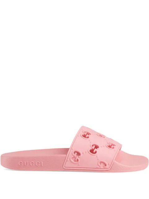 Gucci Rubber GG Slide Sandals - Farfetch | Farfetch (US)