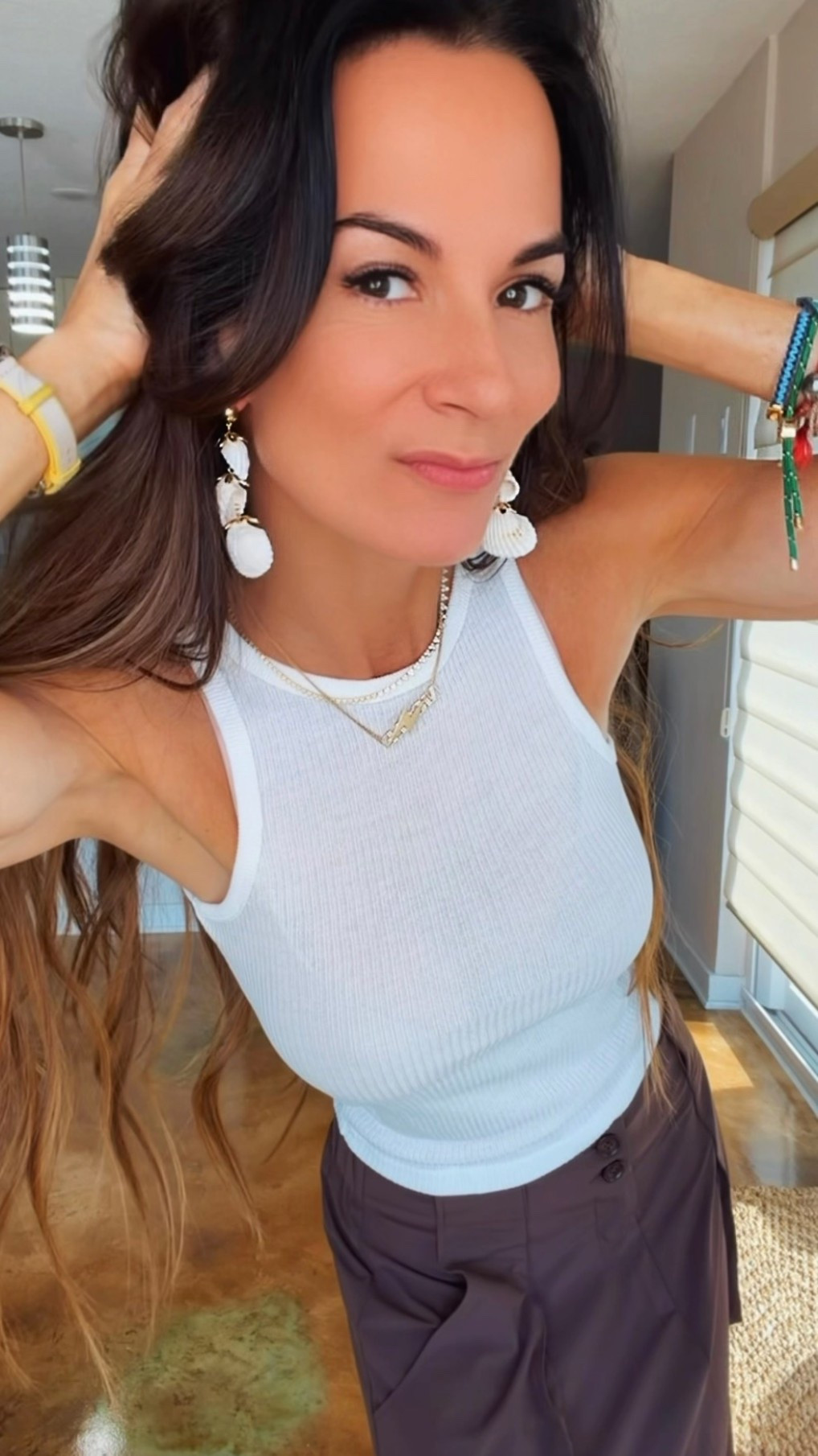 Sometimes the outfit is simple… and that’s exactly why the accessories deserve their moment. 🤍✨

A white tank. Easy draped skirt. Neutral everything.

Then you add a pair of statement earrings… and suddenly the whole look feels intentional.

These shell beauties instantly make even the most basic outfit feel vacation-ready, polished, and just a little more fun. That’s the magic of great accessories—they do all the heavy lifting so your outfit doesn’t have to.

Proof that you don’t need a new wardrobe… sometimes you just need better earrings. 😉🐚

#NicoleColeeStyle #SummerStyle #StatementEarrings #ResortStyle #AccessoryObsessed

#LTKdayinmylife #LTKgrwm #LTKootd