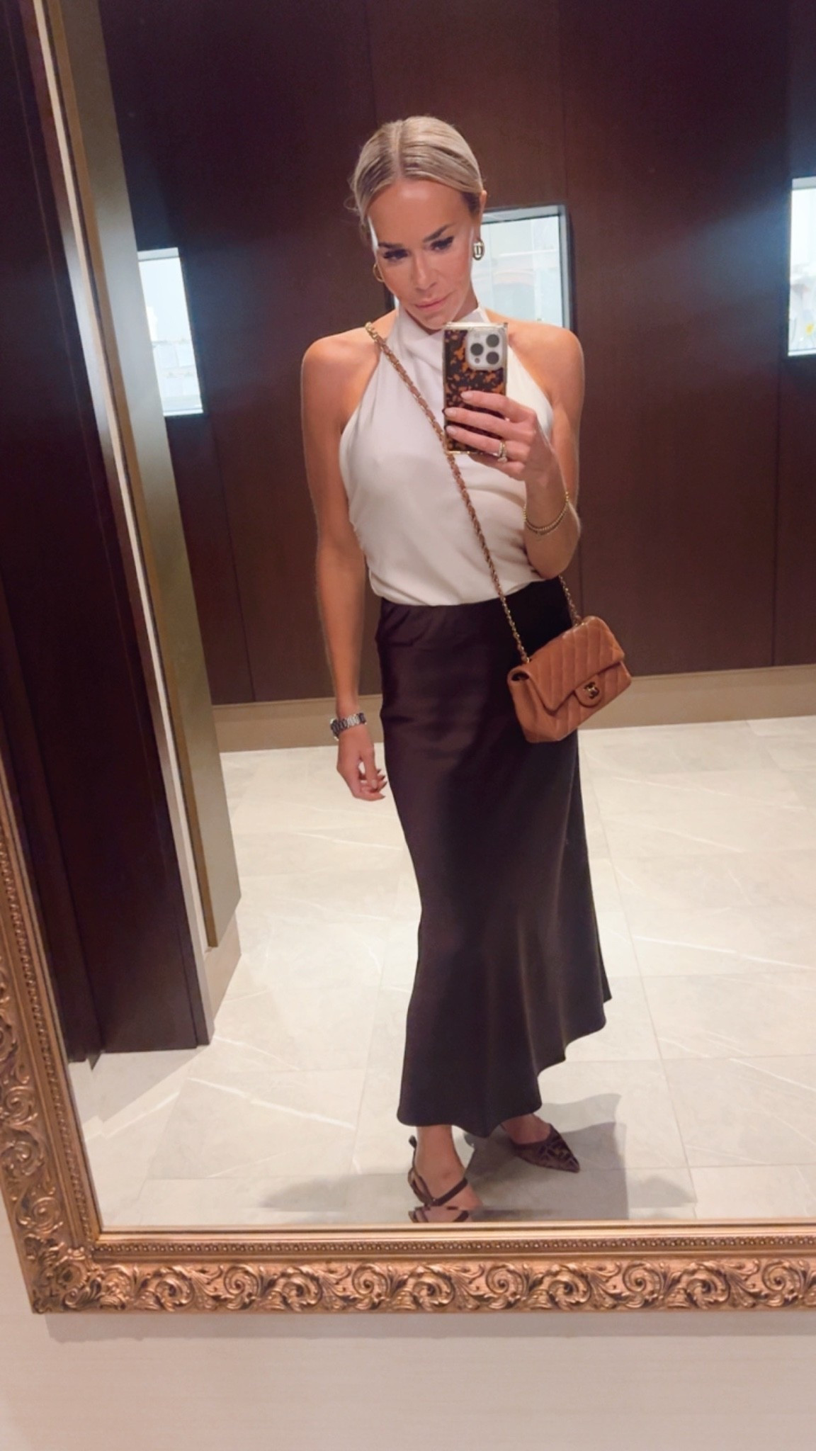 Slip skirt perfection for dinner in lake country. 🍇🍷Wearing xs in the skirt and 2 in the top. Both are available in several colors. Love the fit of the halter so much I will definitely be getting more!