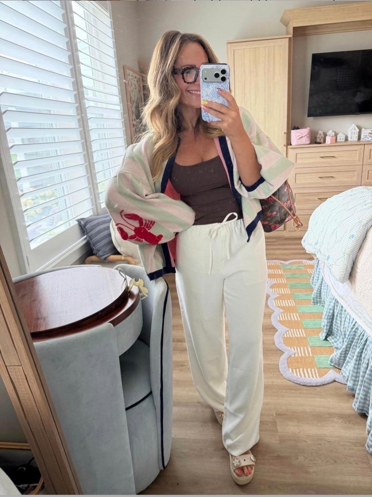 Lightweight lounge pants, a buttery-soft tank, the cutest coastal cardigan, and comfy platform sandals… this is the kind of outfit you’ll wear from slow mornings at home to coffee runs and weekend errands. Comfortable, flattering, and easy to mix and match.

#LTKStyle #CoastalStyle #NeutralOutfit #LoungePants #CardiganOutfit #EverydayStyle #CasualChic #ResortStyle #TravelOutfit #PetiteFashion