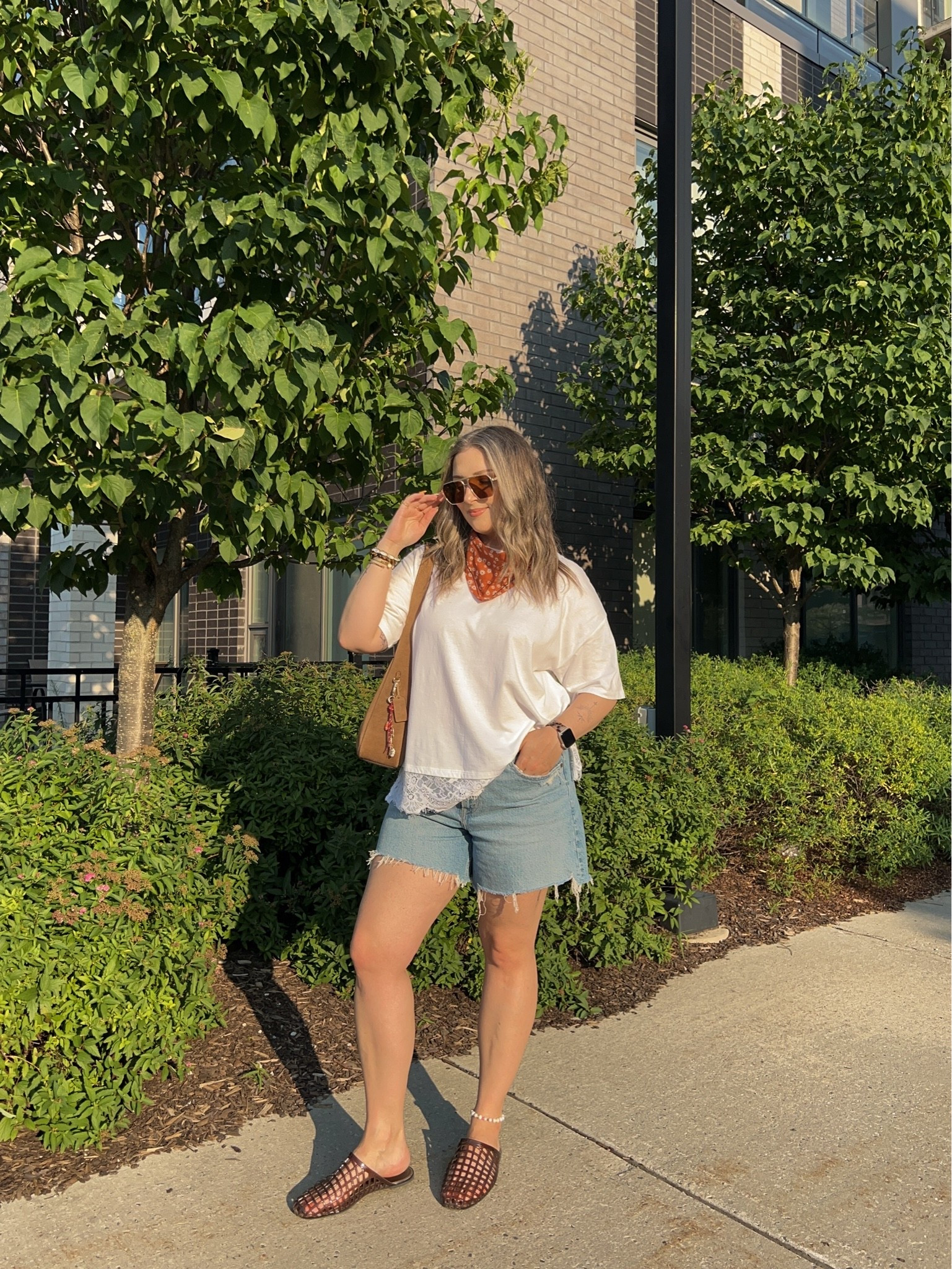 Easy summer outfit! Wearing L in the lace trim tee and sized up to 32 in the denim shorts for a loose fit. I’m a 9.5-10 shoe and wear a 10 in the jelly shoes. Canadian tee & shoes links are under “similar products”. Also linked similar bandanas!

#LTKsummer #LTKmidsize #LTKsale