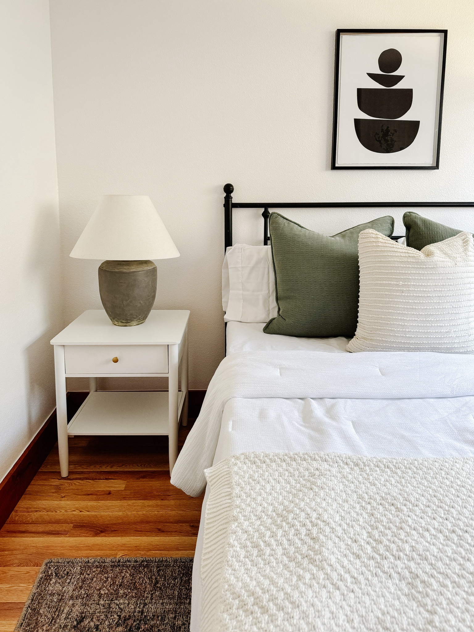 We love adding decorative pillows for a subtle pop of color! These green beauties here have us wanting to dive right into that bed! 

#LTKHome #LTKSaleAlert #LTKU