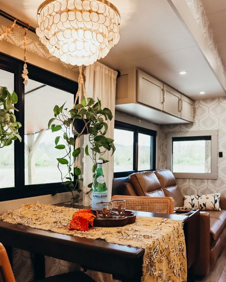 Added this beautiful capiz chandelier to our RV dining area, and living for the soft, cozy vibes that it brings to the space 

#rvdecor #bohointeriors 

#LTKhome