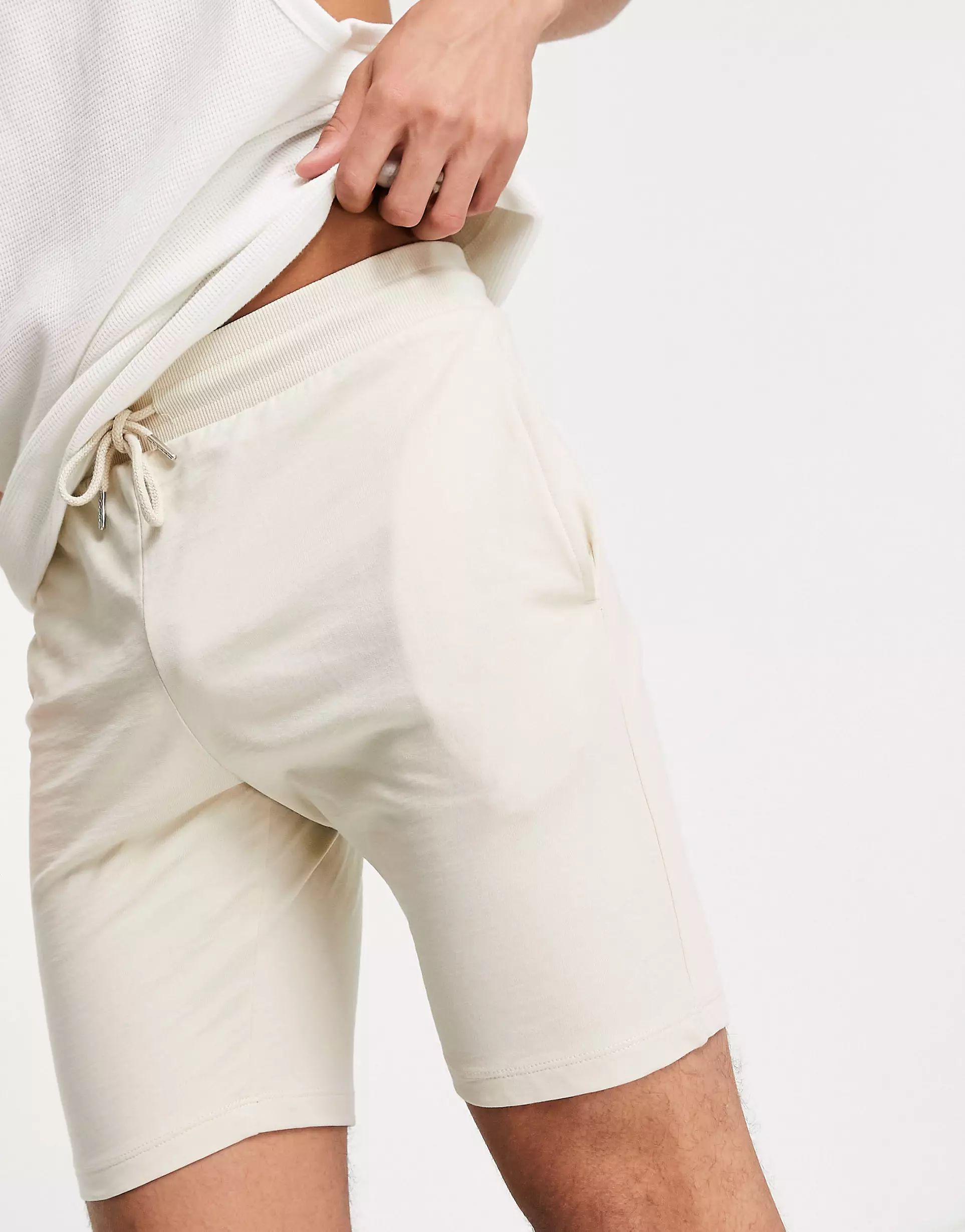 ASOS DESIGN organic lightweight skinny jersey shorts in beige | ASOS (Global)