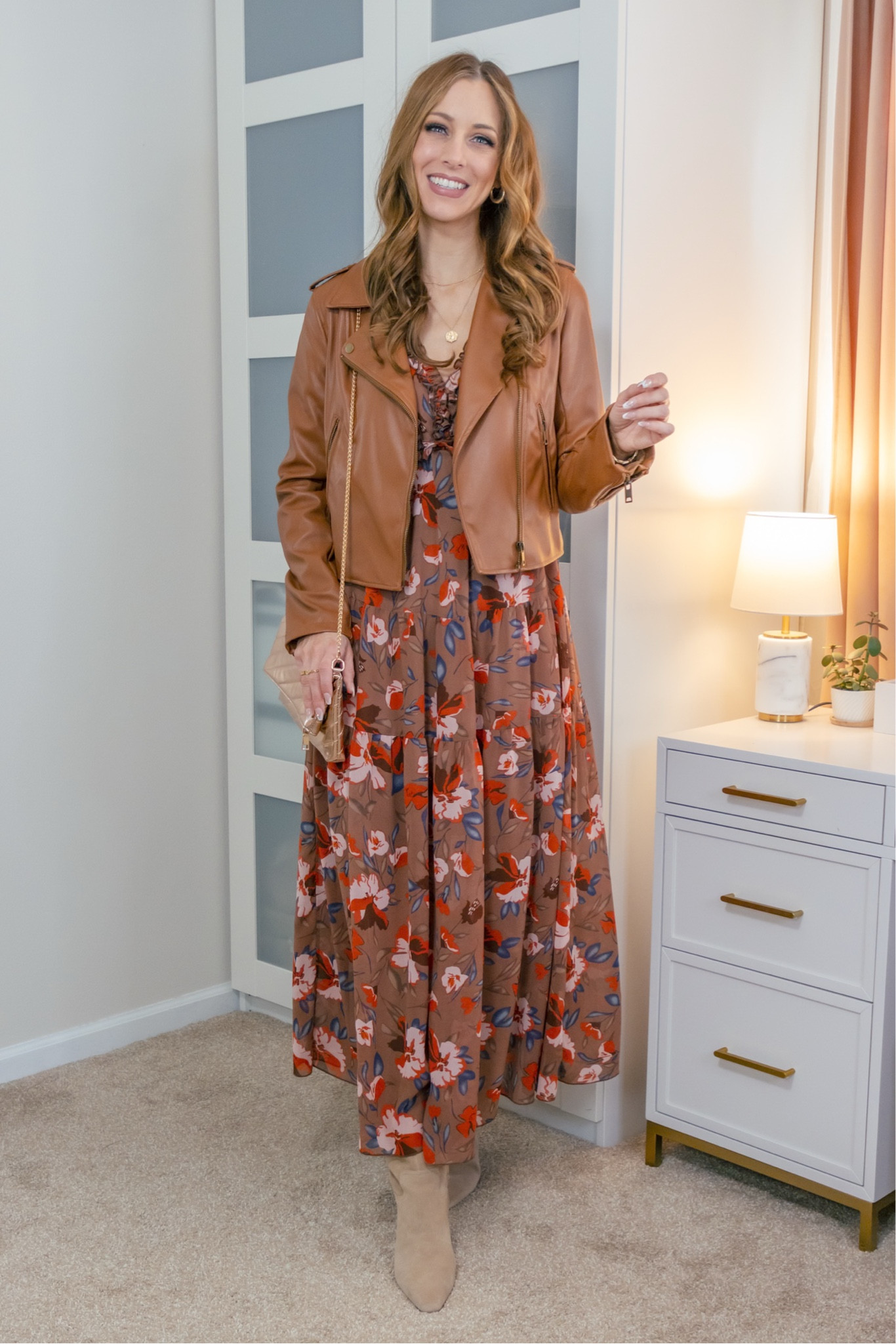 Winter to spring transition outfit. Would be really cute for fall too!
Floral dress: I’m in a size small in the brown color option.
Moto Jacket: I’m in a size small in the cognac color option



#LTKStyleTip #LTKSeasonal #LTKFindsUnder100