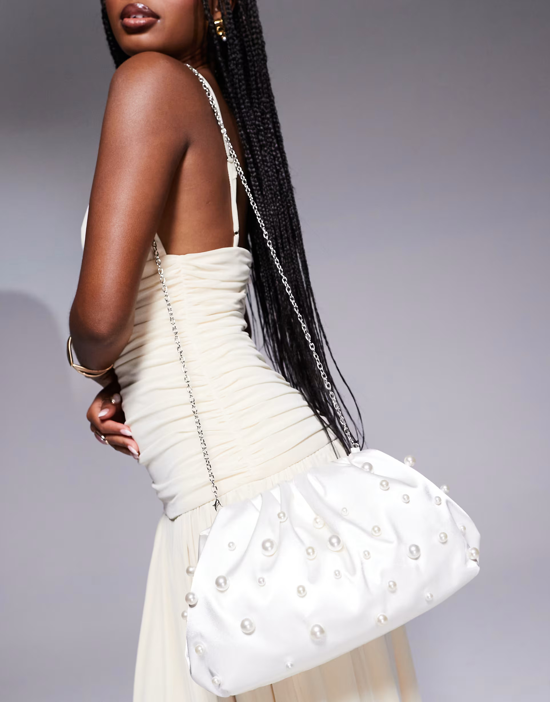 True Decadence pillow clutch bag with pearl embellishment in ivory | ASOS (Global)