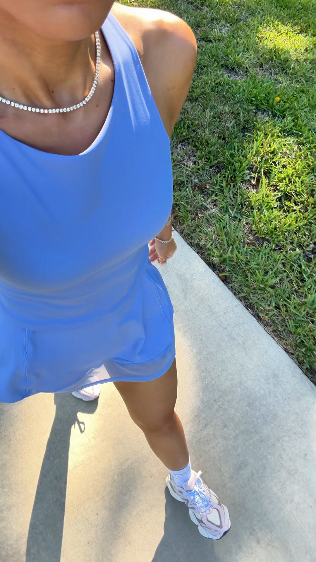 Hot girl walk in the cutest matching skort set from Spanx! XS in both. Skort has mid-tummy compression and really holds you in! This fabric has 4-way stretch and UPF 50+ sun protection. Top has built-in FlexForm Cups to provide moderate support and I love the high neck! Code LISAMARIEXSPANX for 15% off first purchase + free shipping, excluding sales @Spanx #spanxpartner