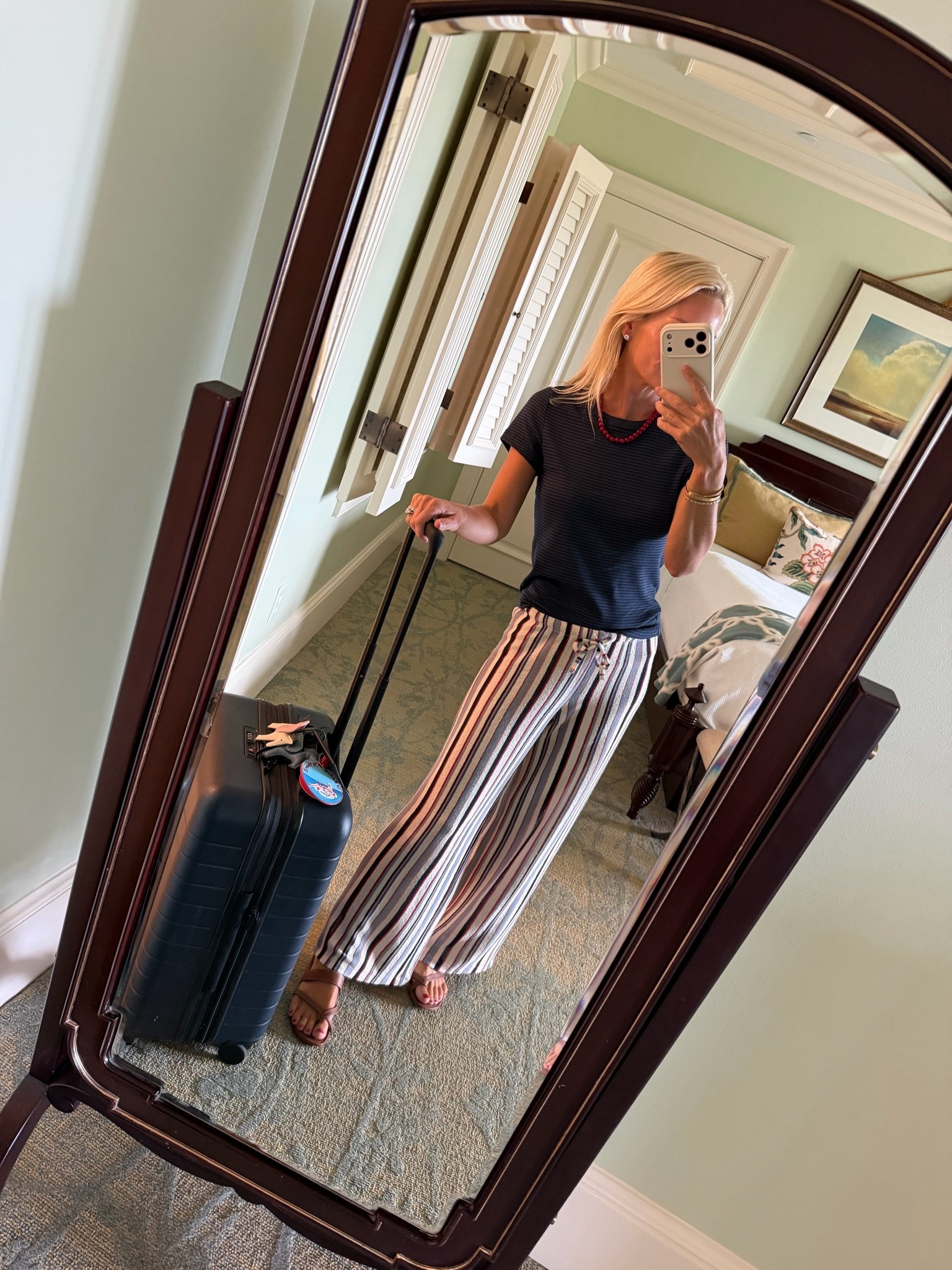 These H&M knit striped drawstring pants are soooo comfortable making them the perfect travel day pants 
Away suitcase 
Navy blue tee

#LTKTravel #LTKootd #LTKdayinmylife