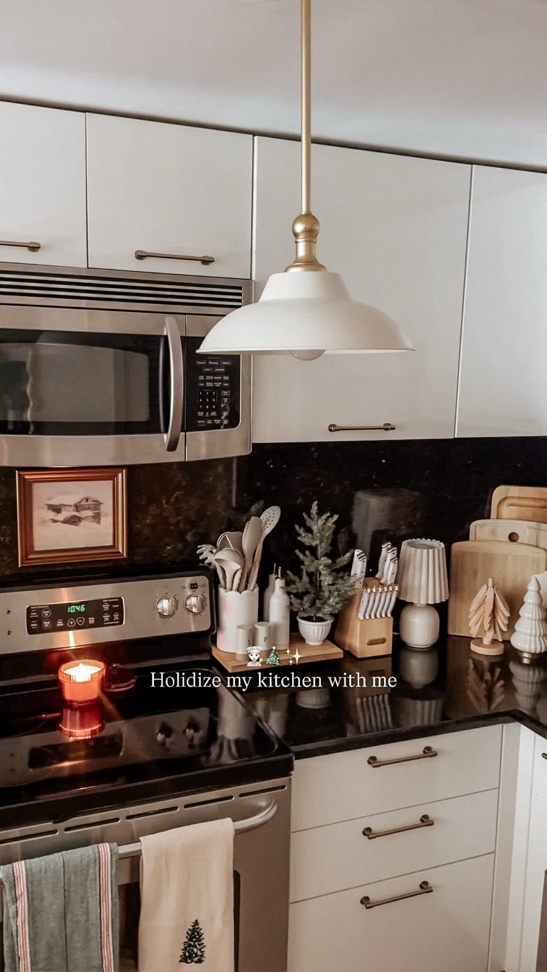 Holiday decorating under the warm glow of my new @rowabi.interiors Tresor Pendant Light 🎄✨

The matte ivory and brass combo feels so clean and elevated – and it makes the Holiday details in my kitchen feel even cozier!

#holidayseason #christmasdecor #lighting 

#LTKHome #LTKHoliday #LTKSeasonal