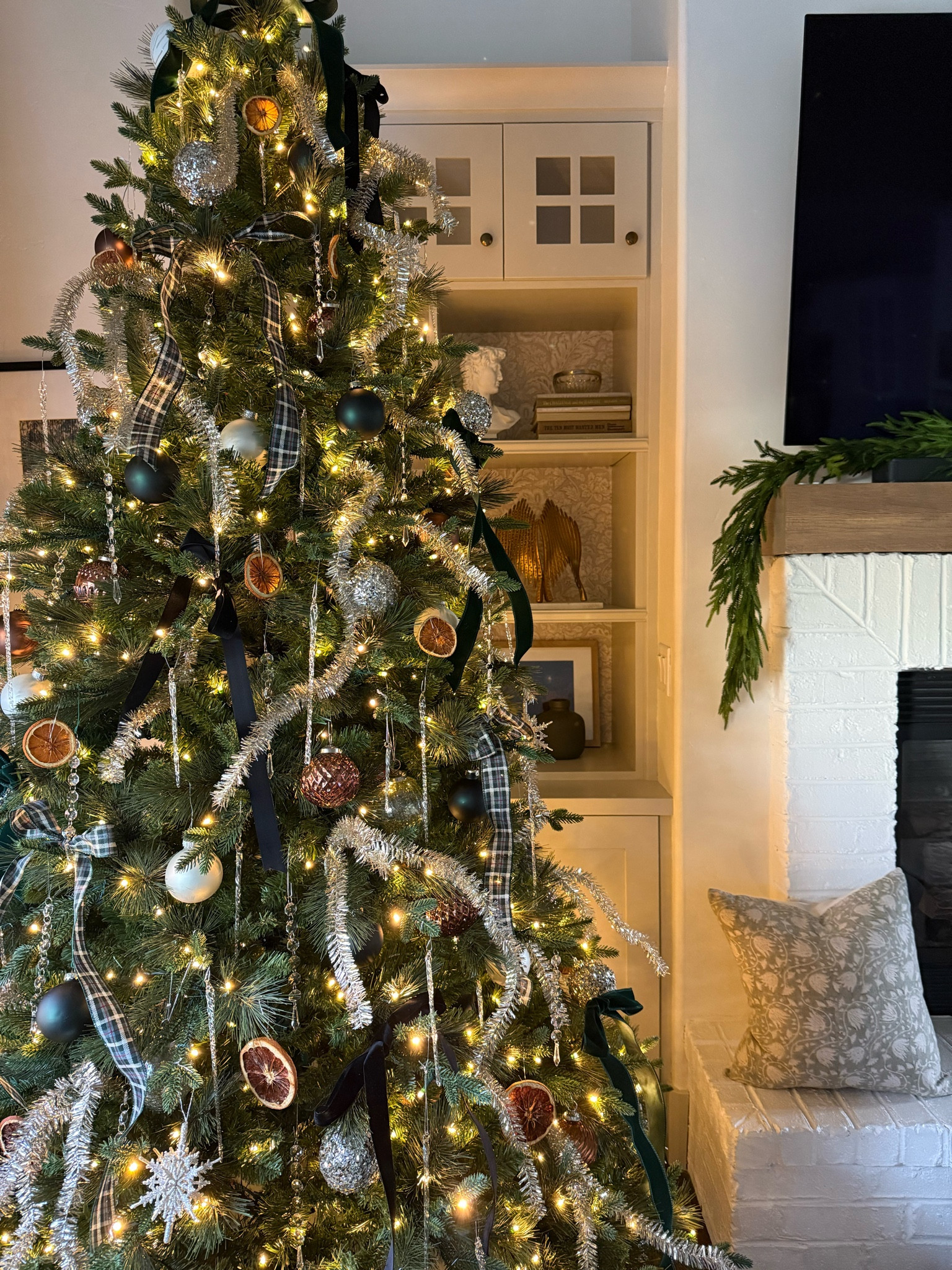 Christmas tree with velvet bows, glass icicles, and dried oranges! Most from home goods :) 

#LTKHome #LTKSeasonal #LTKHoliday