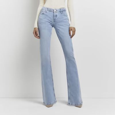 Blue low rise flared jeans | River Island (UK & IE)