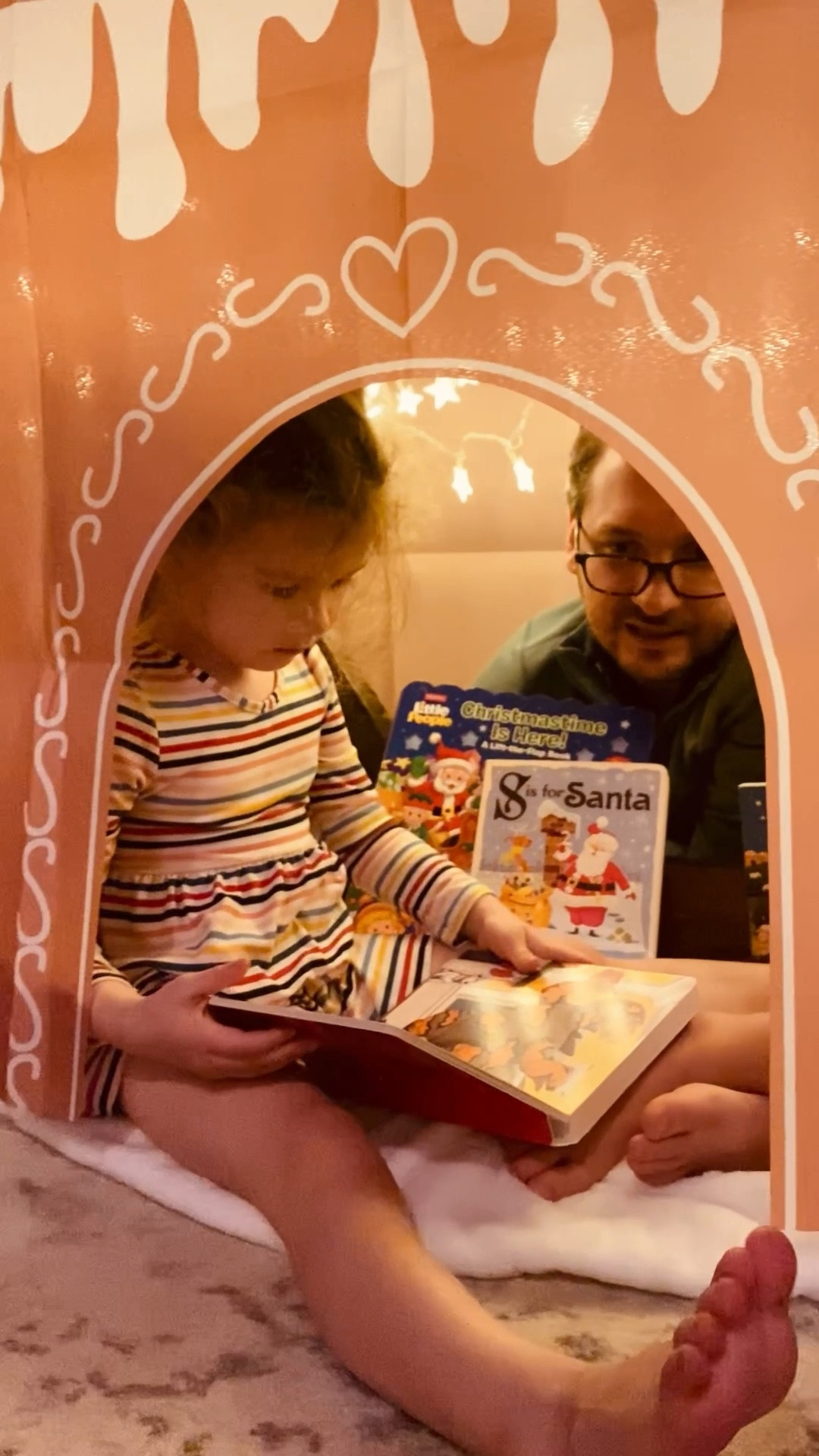 Gingerbread house reading nook for the holidays. Cozy Christmas. Kids play: holiday tradition. Family. Christmas lights. Magical. Christmas books. Table cloth tent. 

#LTKKids #LTKstorytime #LTKHoliday