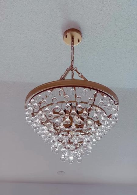 Here’s my chandelier in our family room. Absolutely love it. I had to add each crystal by hand. It’s totally worth it. There’s over 200 crystals so it takes a couple hours. 

#amazonchandelier
#amazonhome

#LTKhome #LTKVideo #LTKfamily